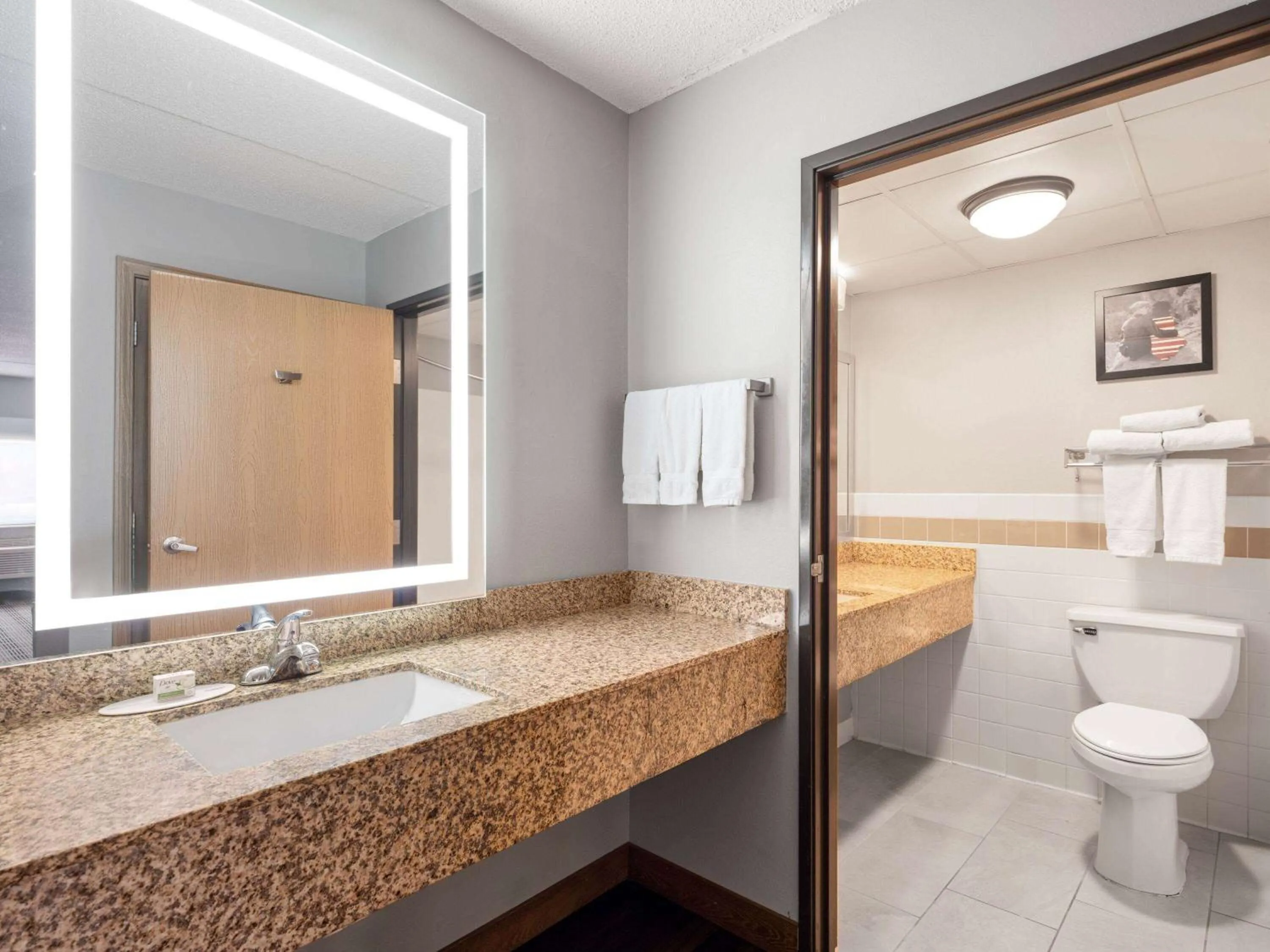 Bathroom in AmericInn by Wyndham Shakopee Near Canterbury Park