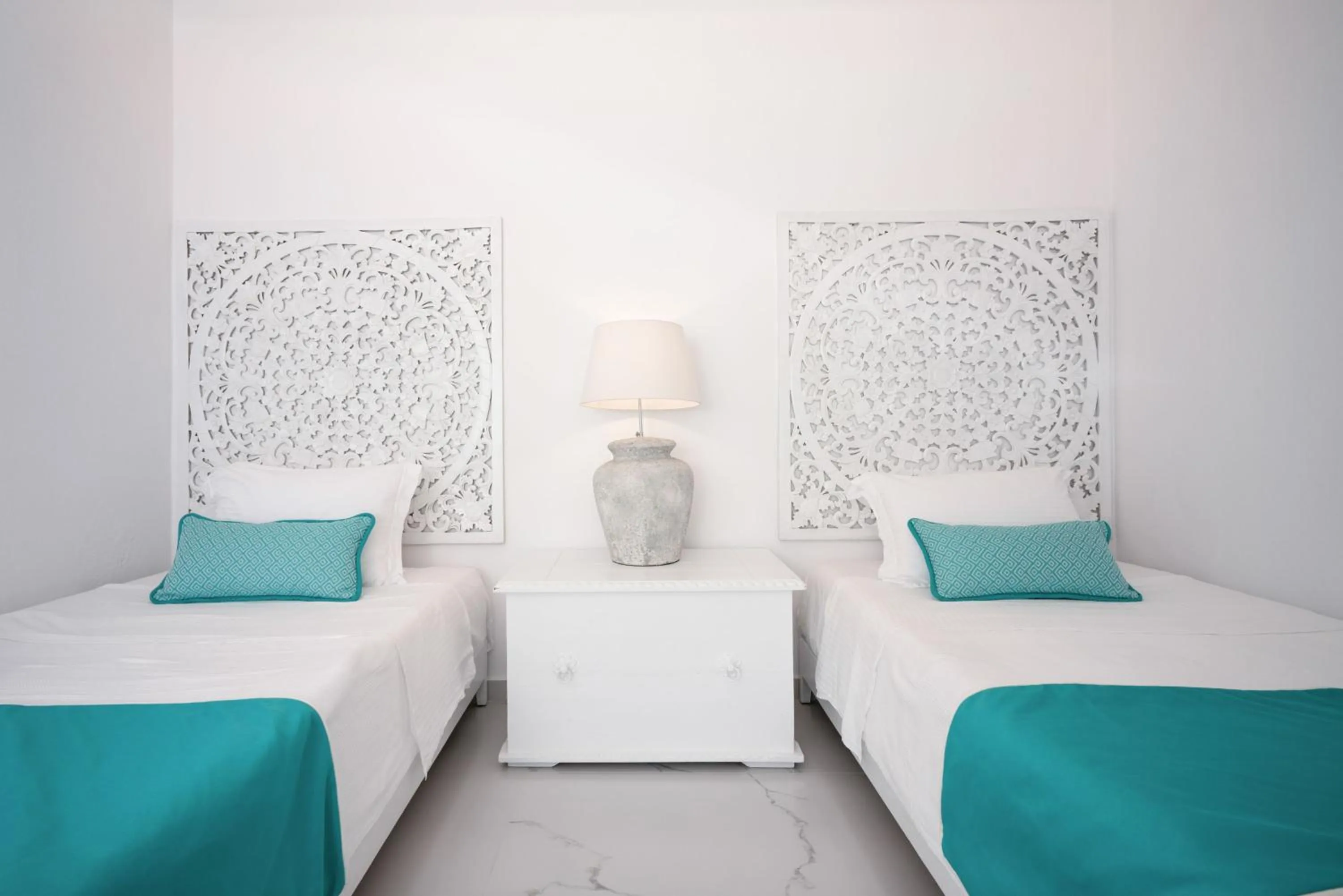 Bed in Oia Sunset Villas