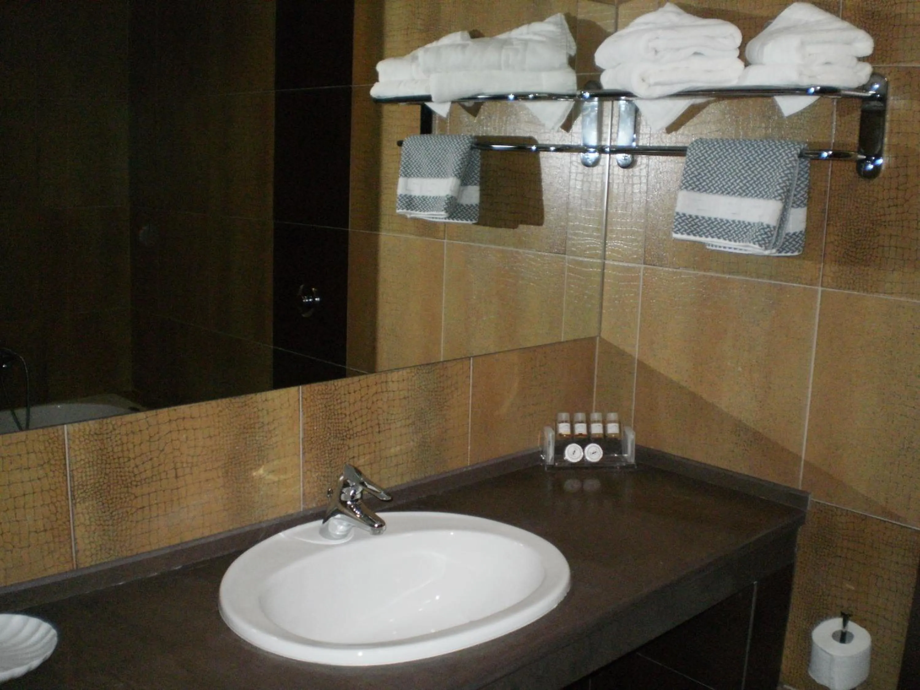 Bathroom in Achillio Hotel