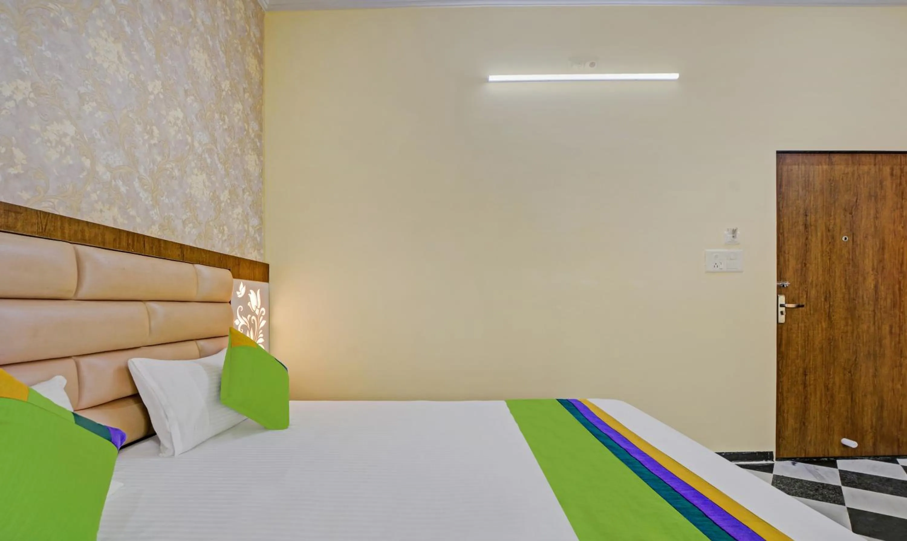 Bed in Hotel Vishvam Residency Udaipur