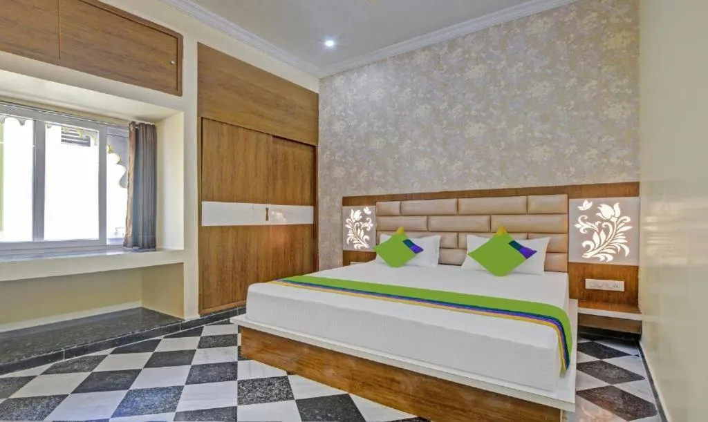 Bed in Hotel Vishvam Residency Udaipur
