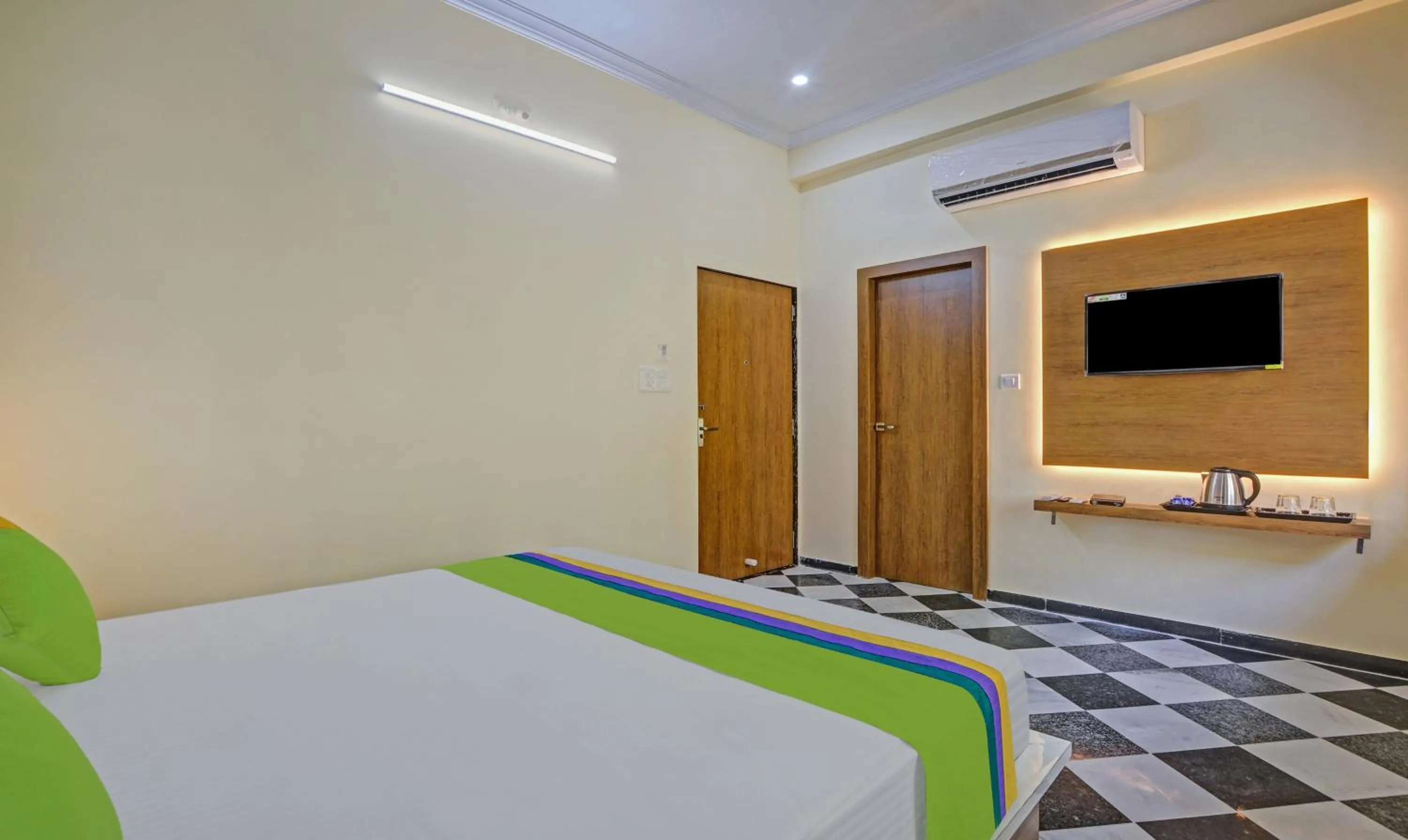 Bed in Hotel Vishvam Residency Udaipur