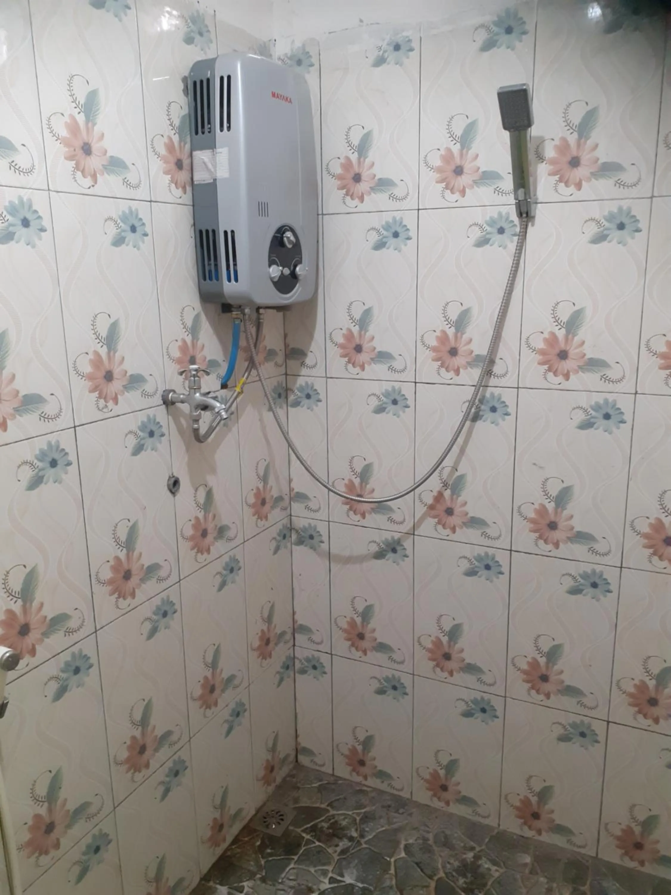 Shower in Ijen Miner Family Homestay
