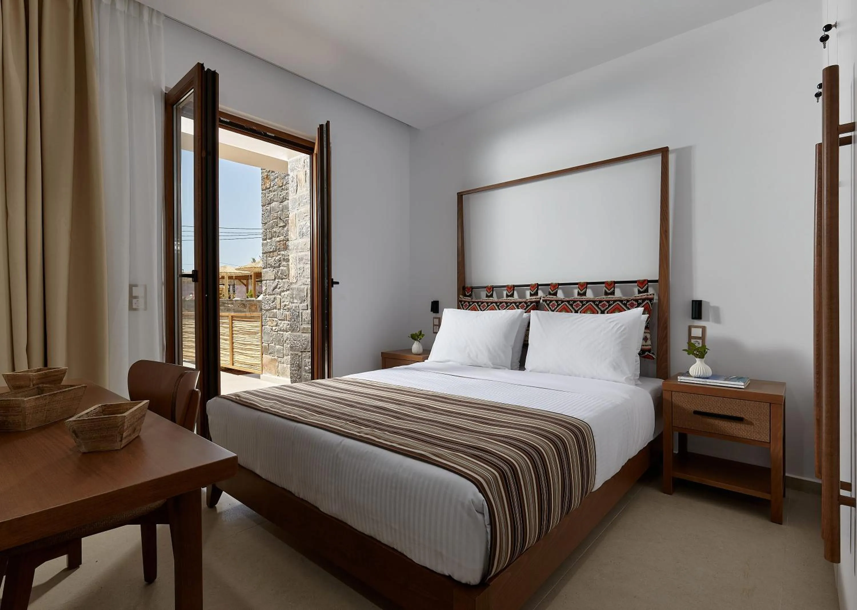 Bed in Volta Suites and Villas