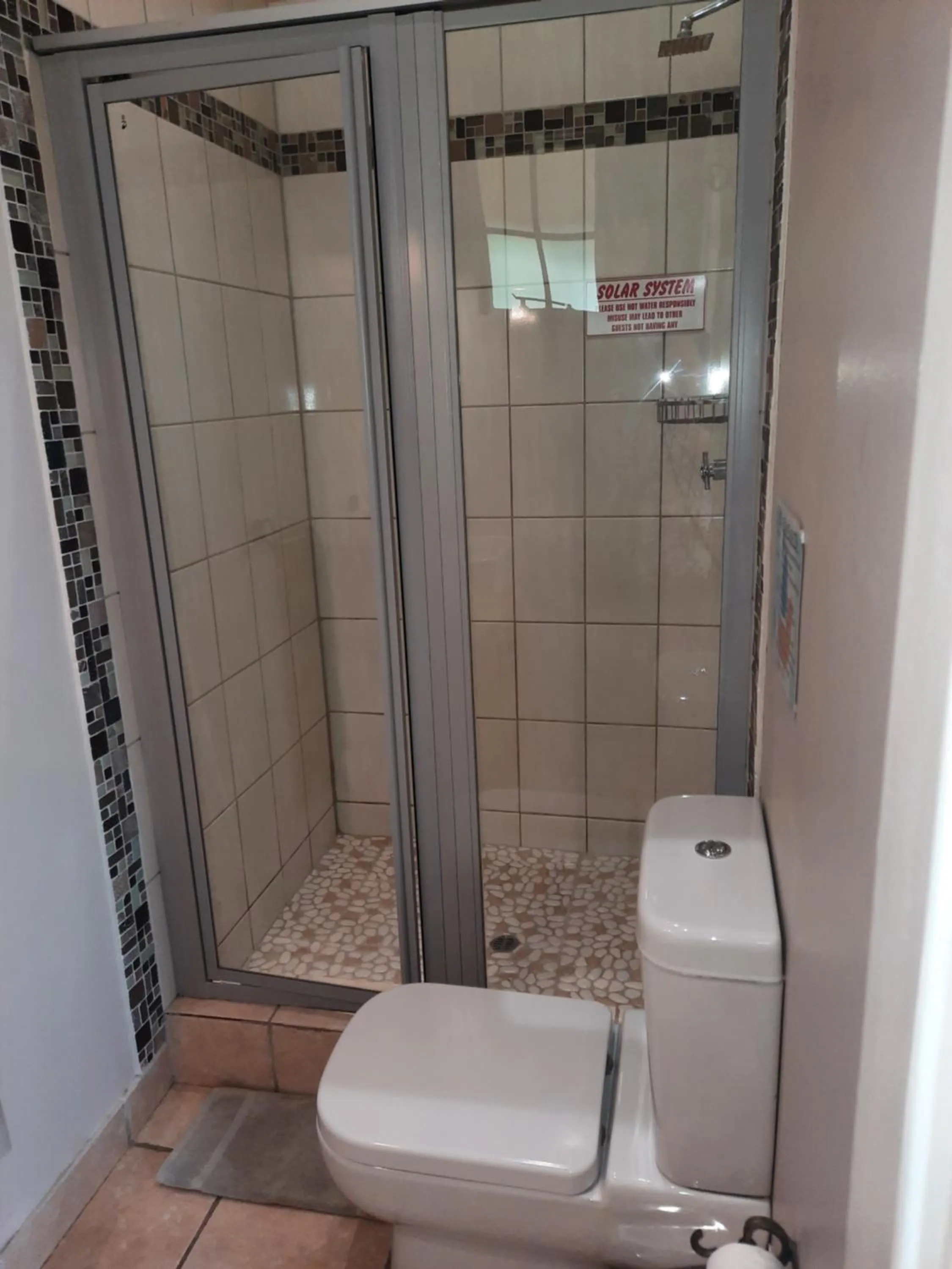 Shower in Villa Beryl Guesthouse