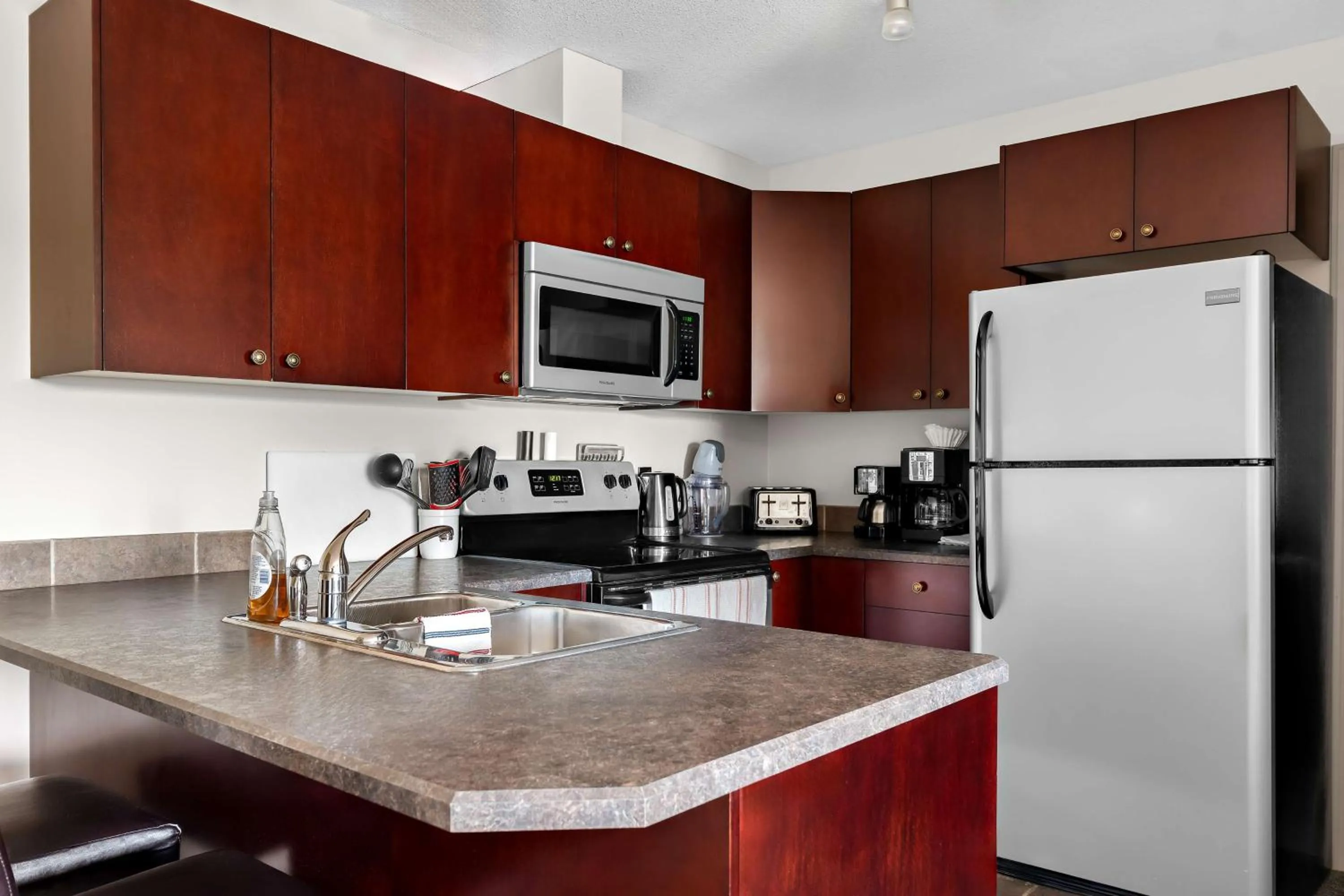 Kitchen or kitchenette in SureStay Plus Hotel by Best Western Hardisty