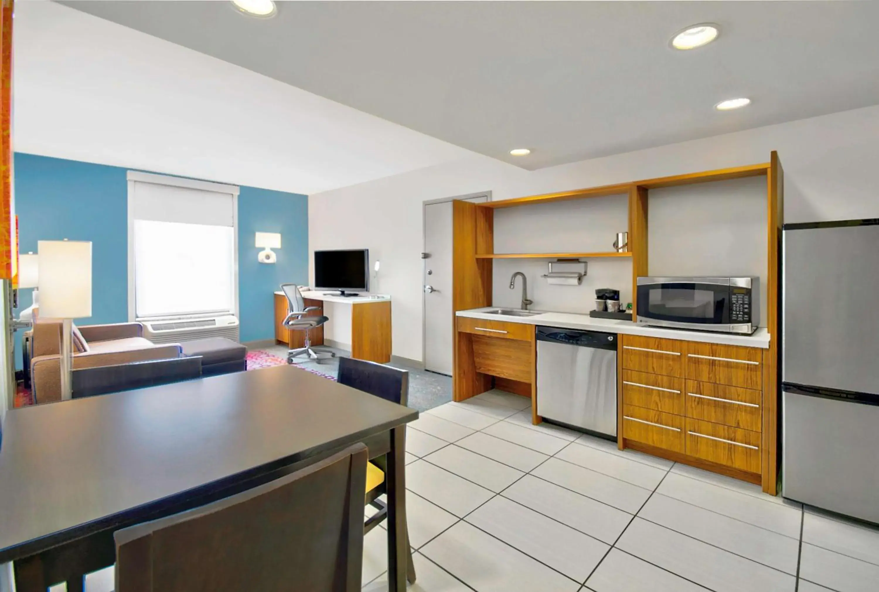 Living room in Home2 Suites by Hilton Rochester Henrietta, NY Living room in Home2 Suites by Hilton Rochester Henrietta, NY