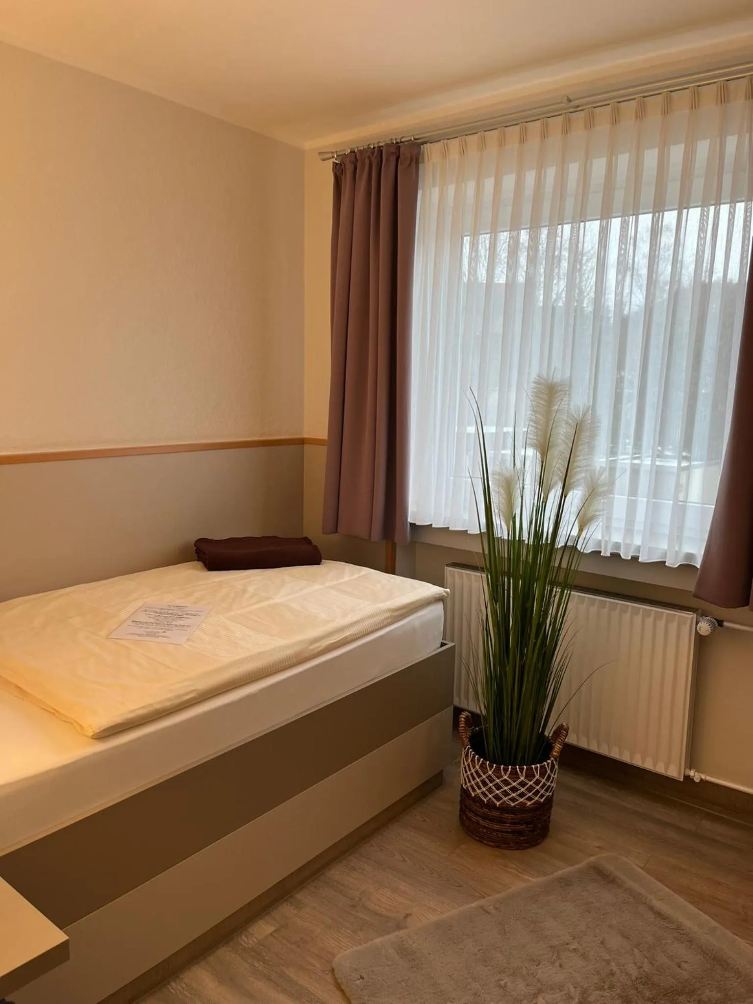Bed in Stadt-gut-Hotel Siegboot
