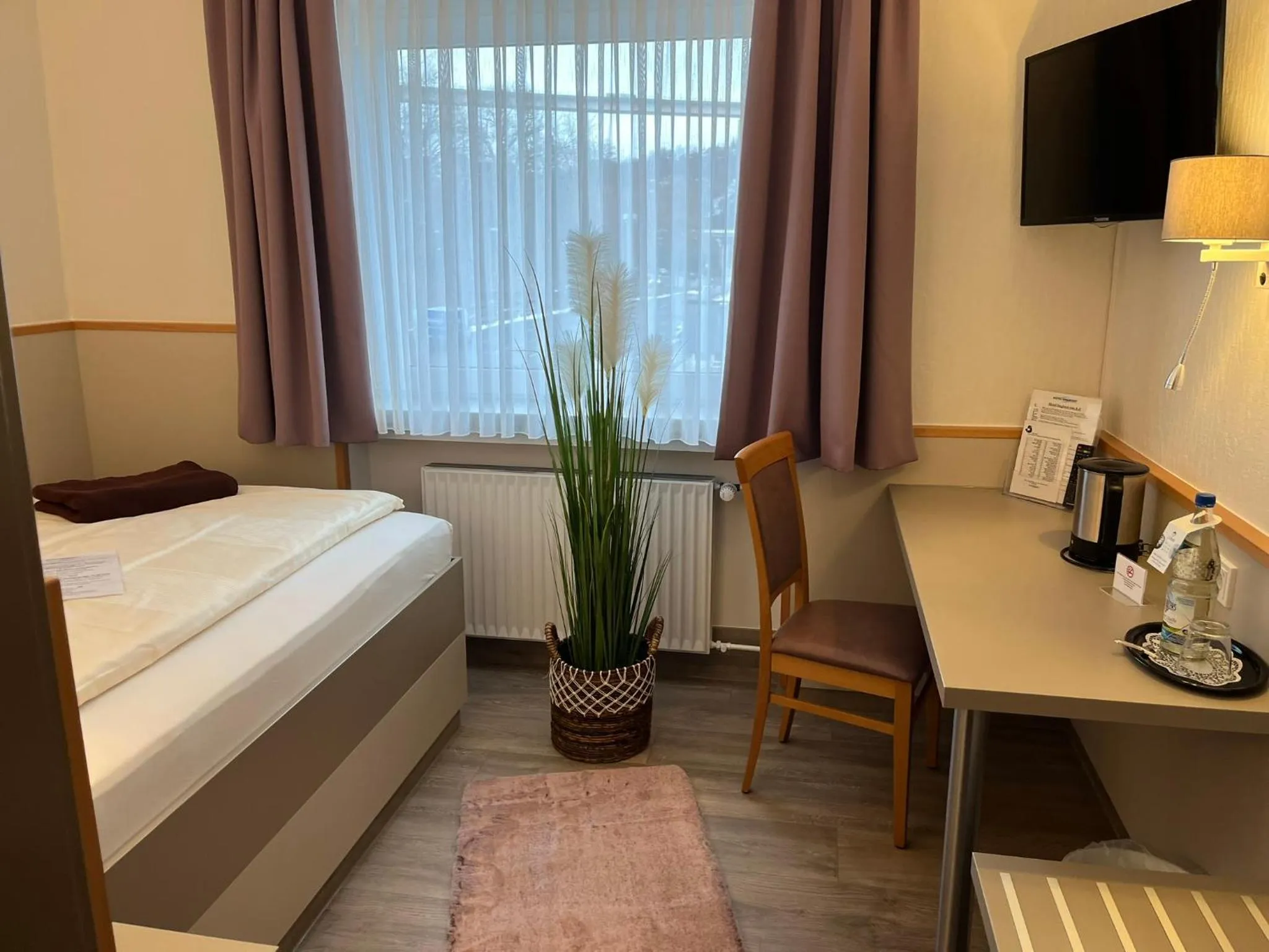 Bed in Stadt-gut-Hotel Siegboot