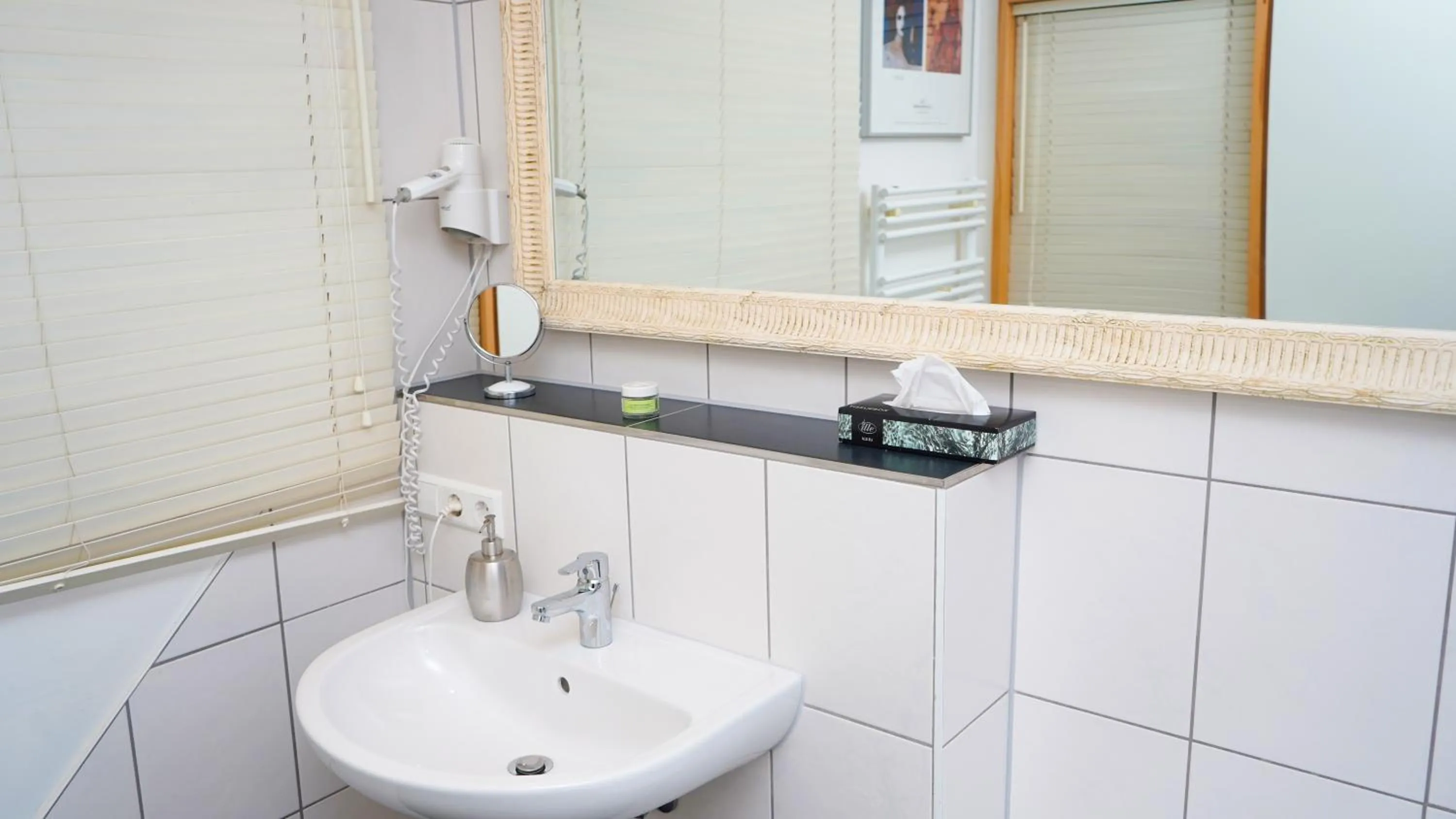 Bathroom in ITM Hotel Bettkästchen am Sachsenwald