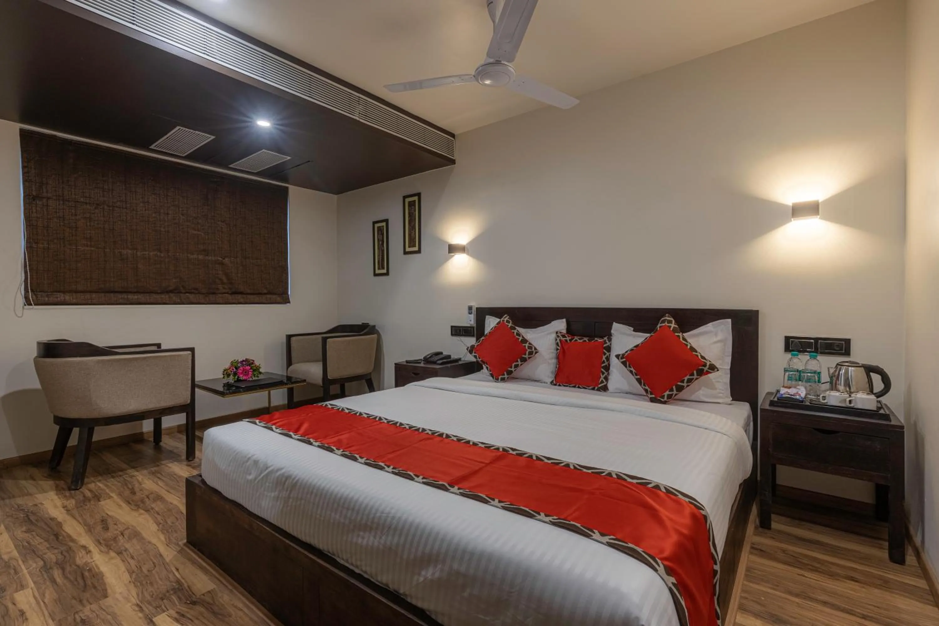 Seating area, Bed in Divan Clarks Inn Goa