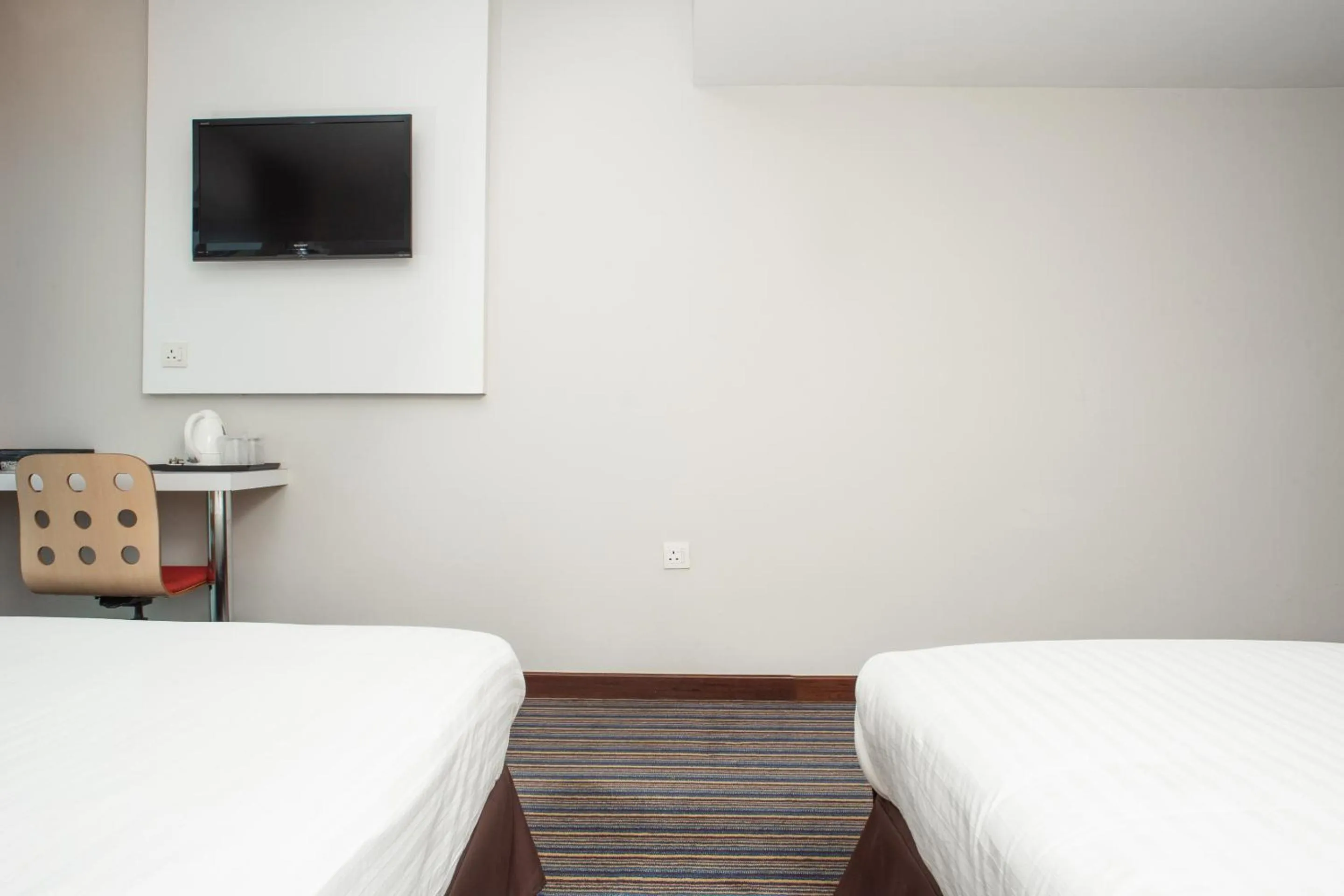 Bed in Capital O 90083 Riverfront Inn