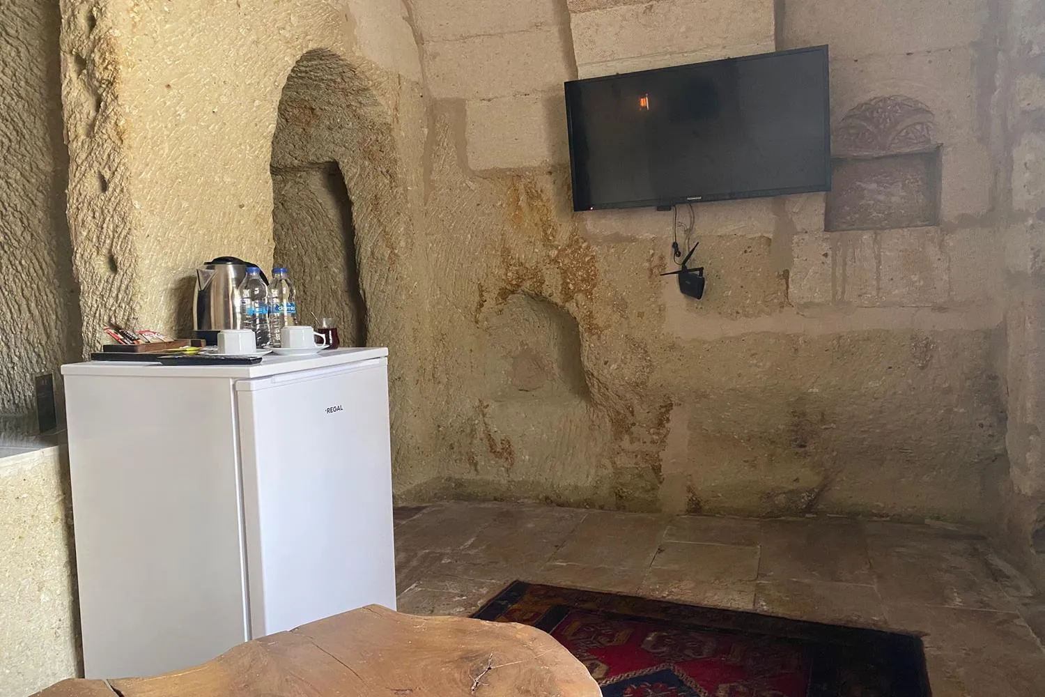 Seating area in Junior Ottoman Cave