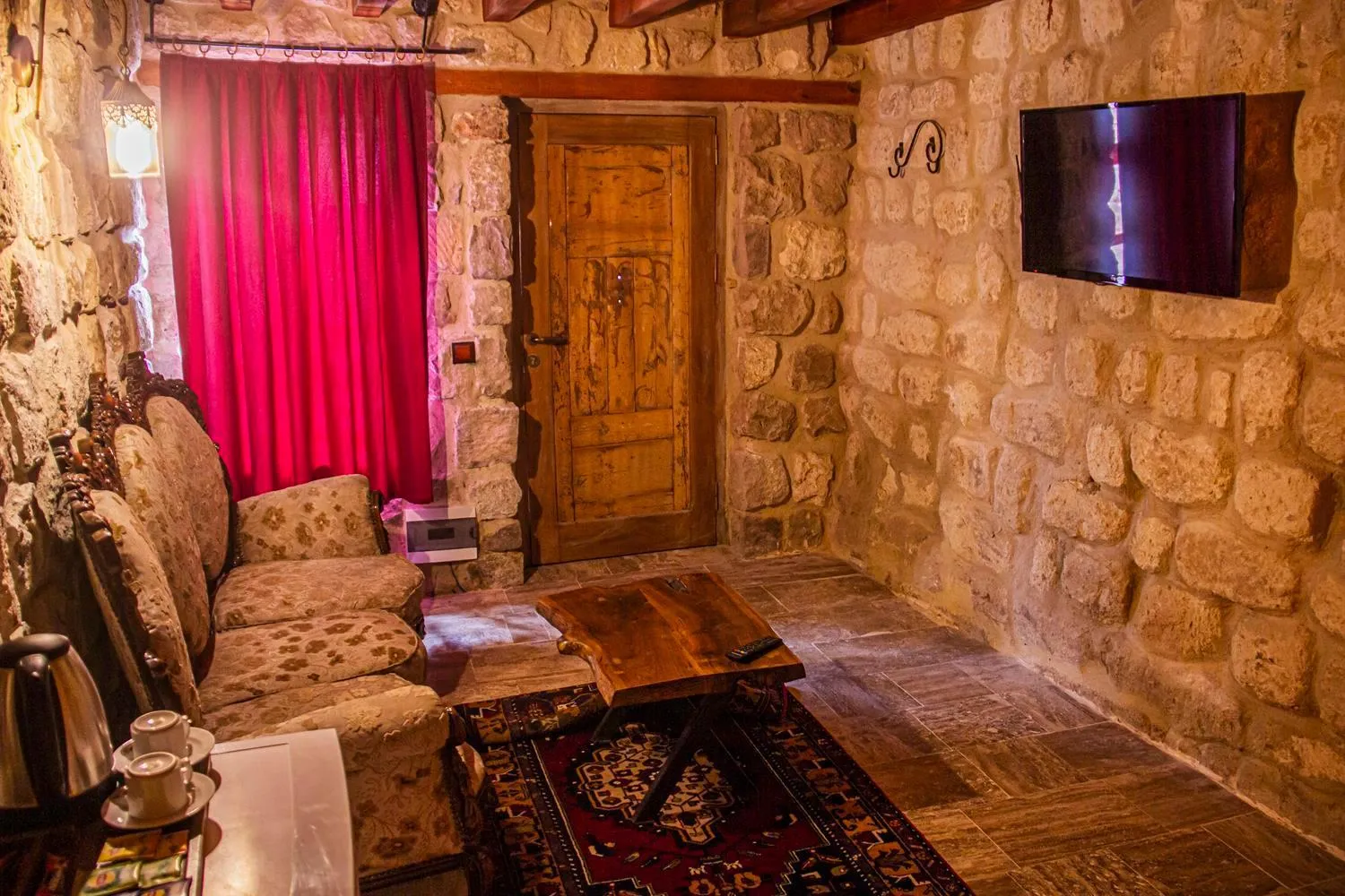 Seating area in Junior Ottoman Cave