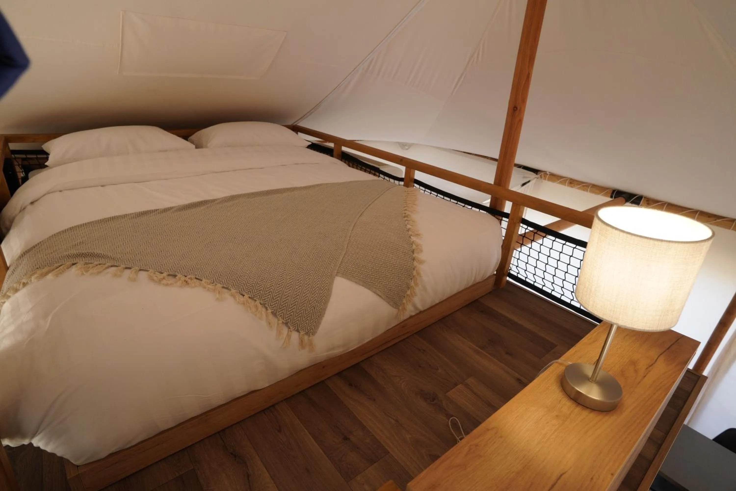 Bed in Bab Al Nojoum Hudayriyat Camp