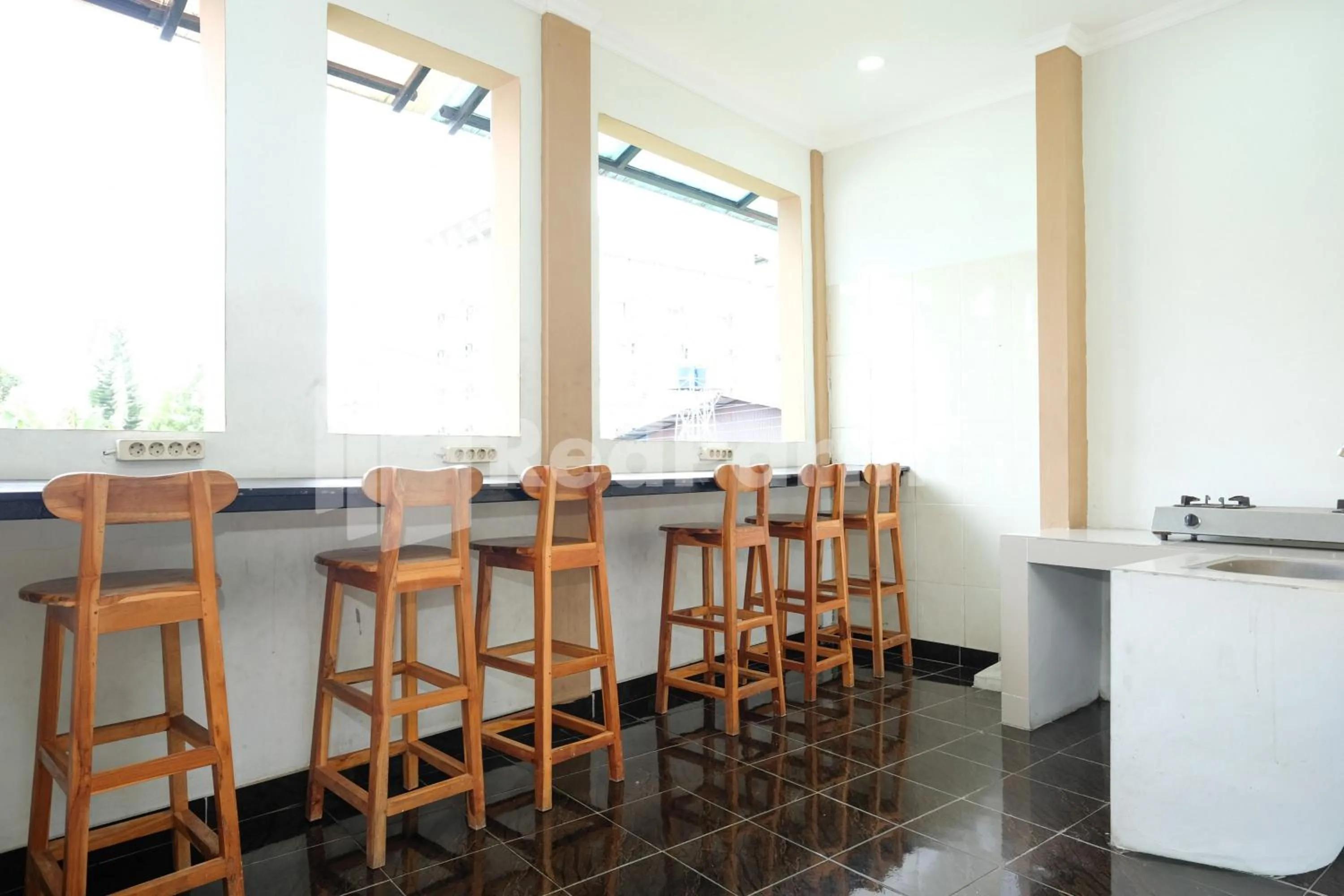 Aster Triplets Guest House JCM Mitra RedDoorz