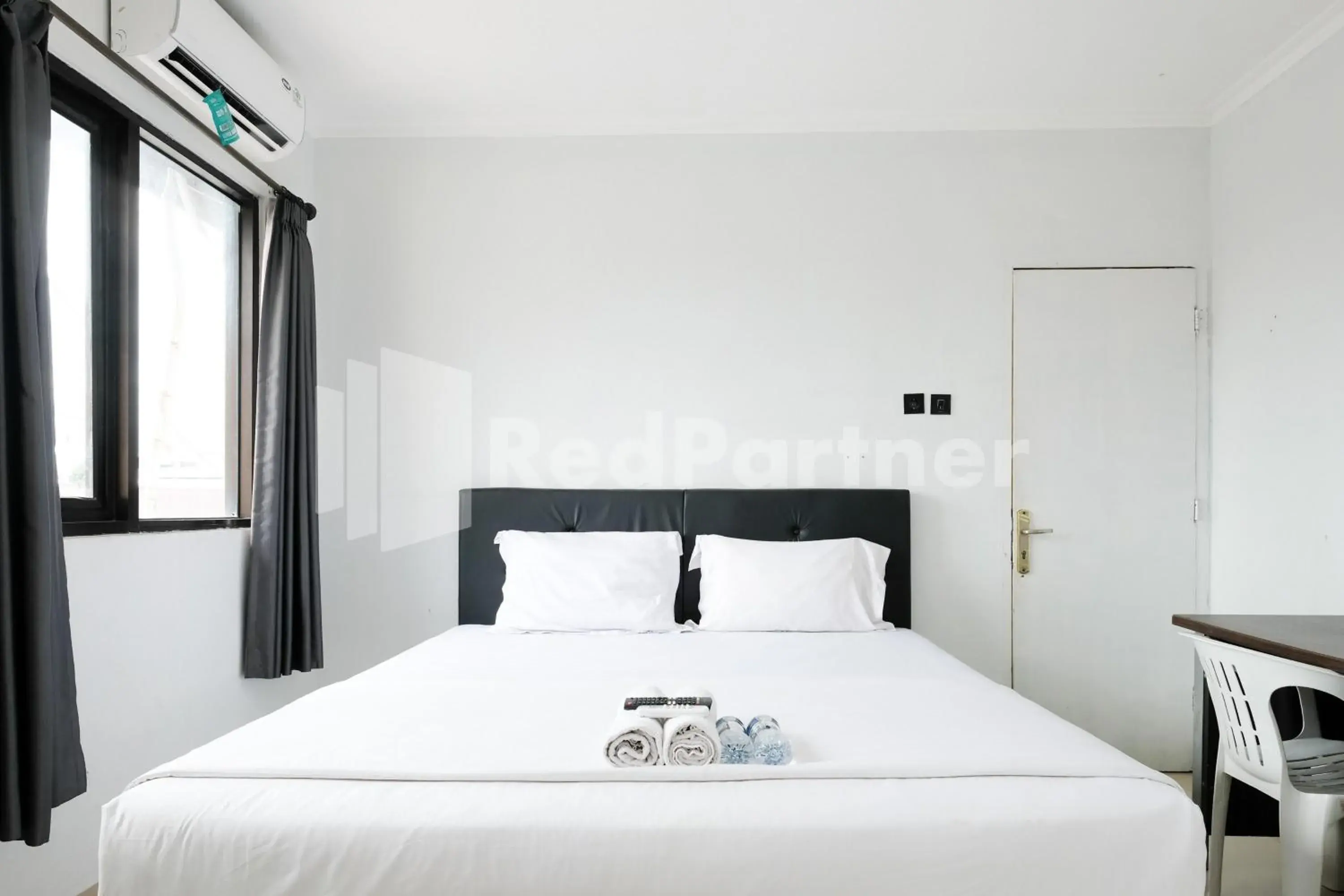 Aster Triplets Guest House JCM Mitra RedDoorz Aster Triplets Guest House JCM Mitra RedDoorz