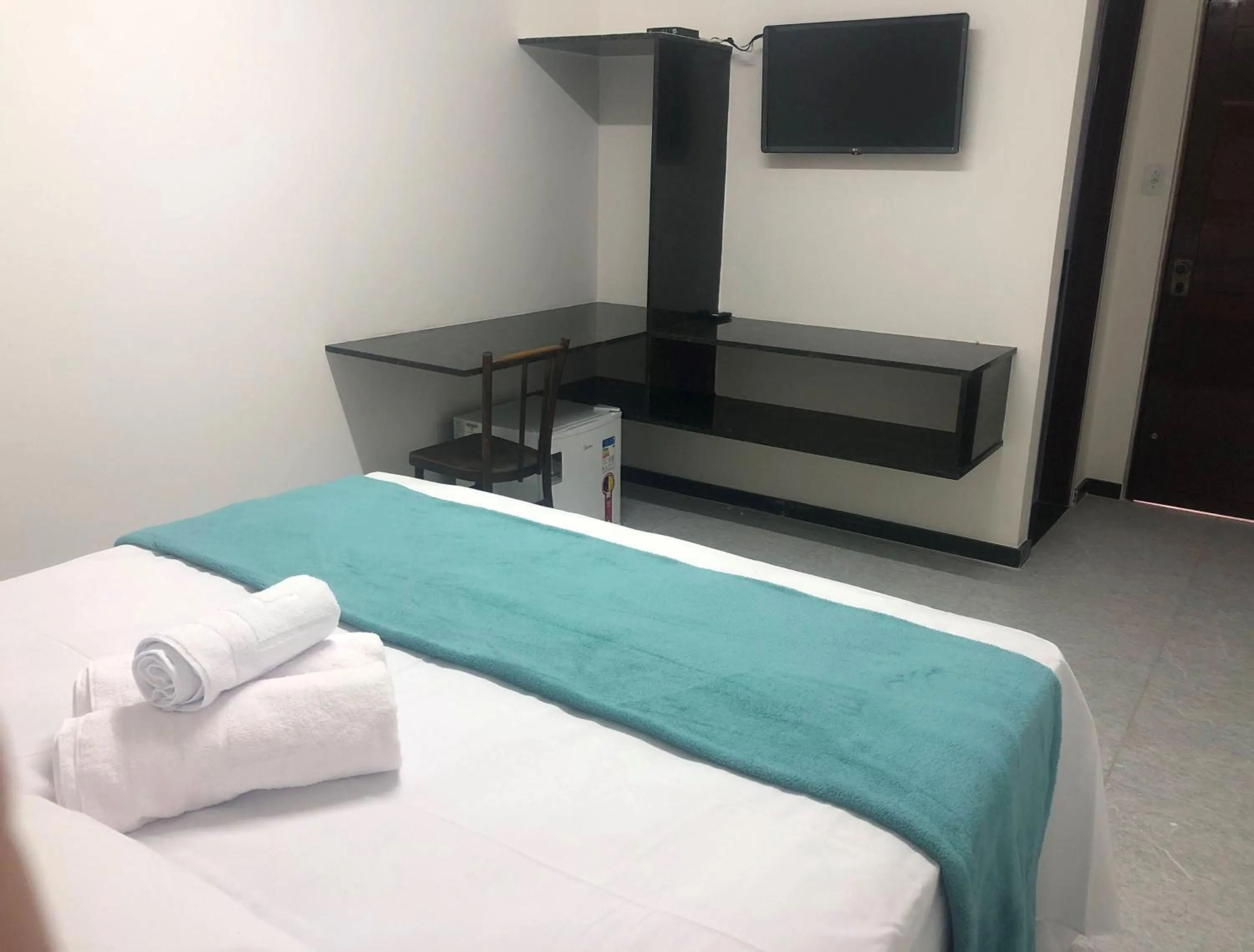 Bed in Pousada La Riviera - Pé na areia e Passeios em Maragogi