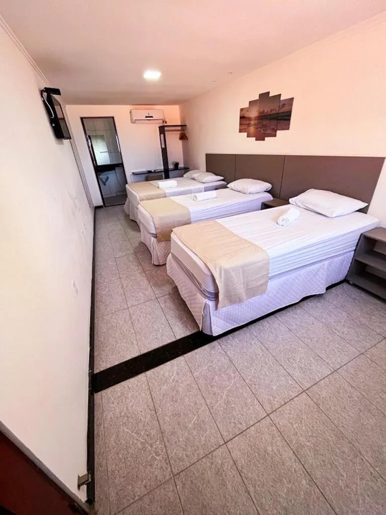 Bed in Pousada La Riviera - Pé na areia e Passeios em Maragogi