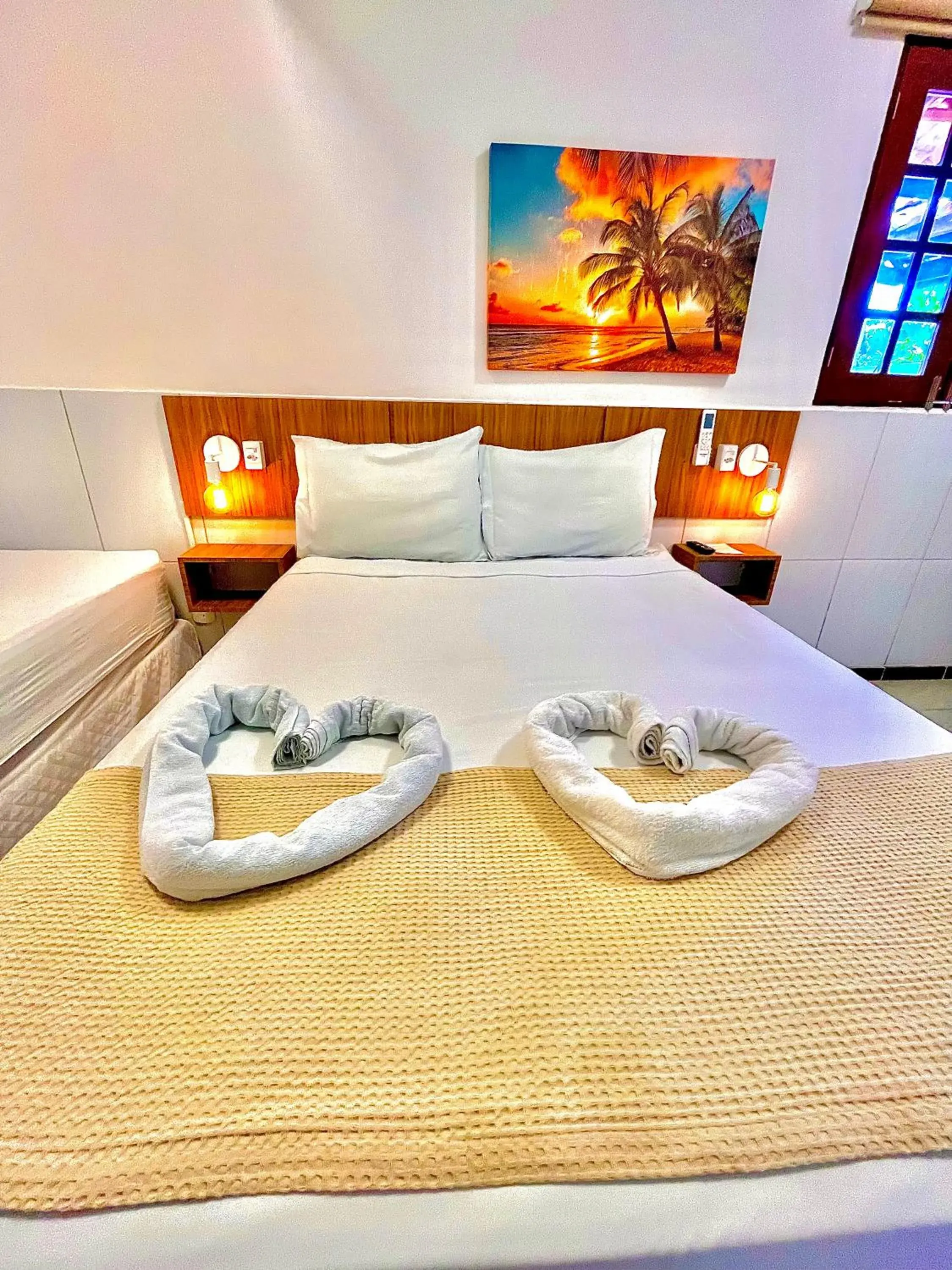 Triple Room with Private Bathroom in Pousada La Riviera - Pé na areia e Passeios em Maragogi Triple Room with Private Bathroom in Pousada La Riviera - Pé na areia e Passeios em Maragogi
