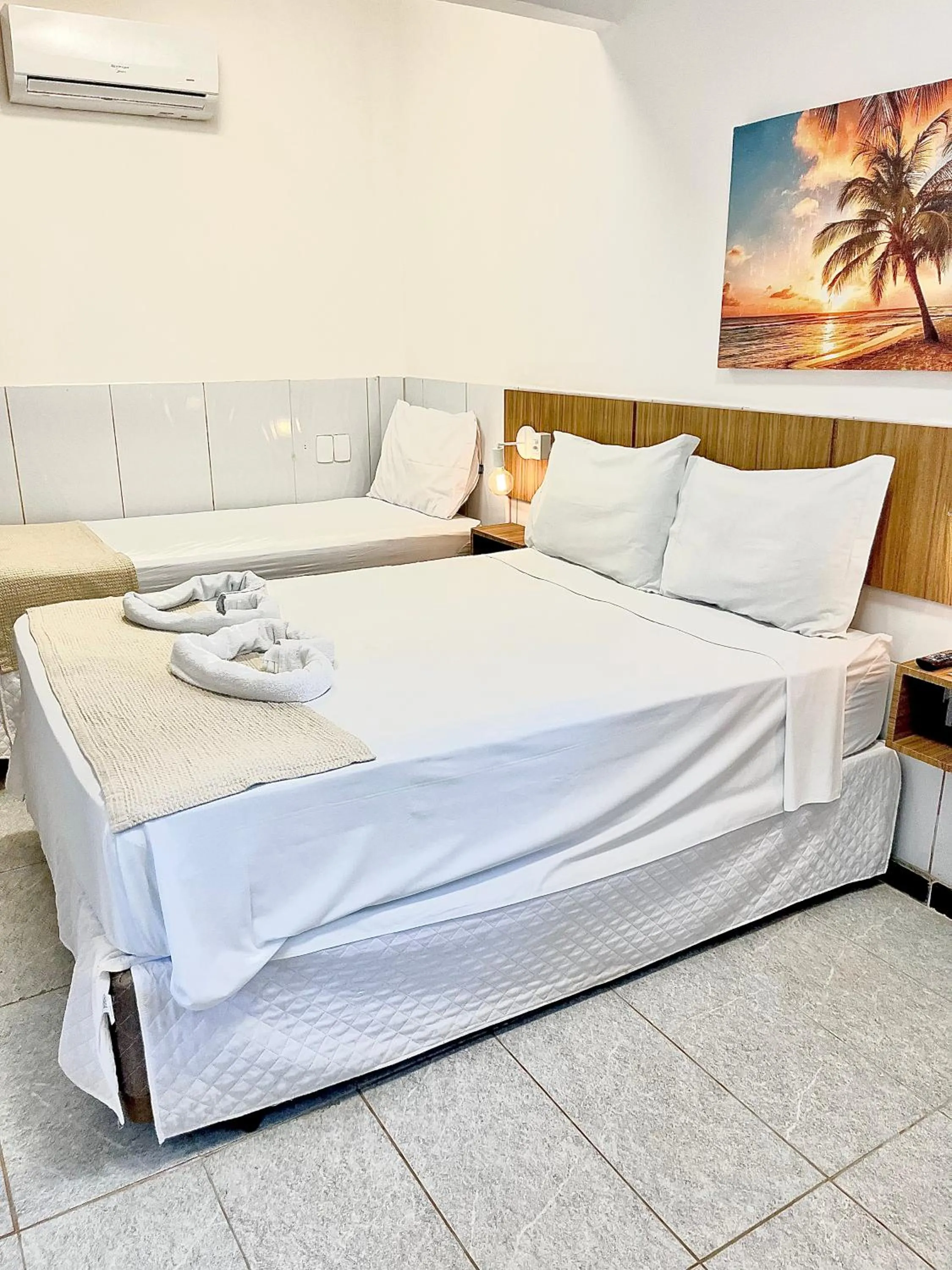 Bed in Pousada La Riviera - Pé na areia e Passeios em Maragogi