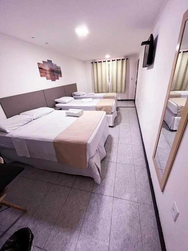 Bed in Pousada La Riviera - Pé na areia e Passeios em Maragogi