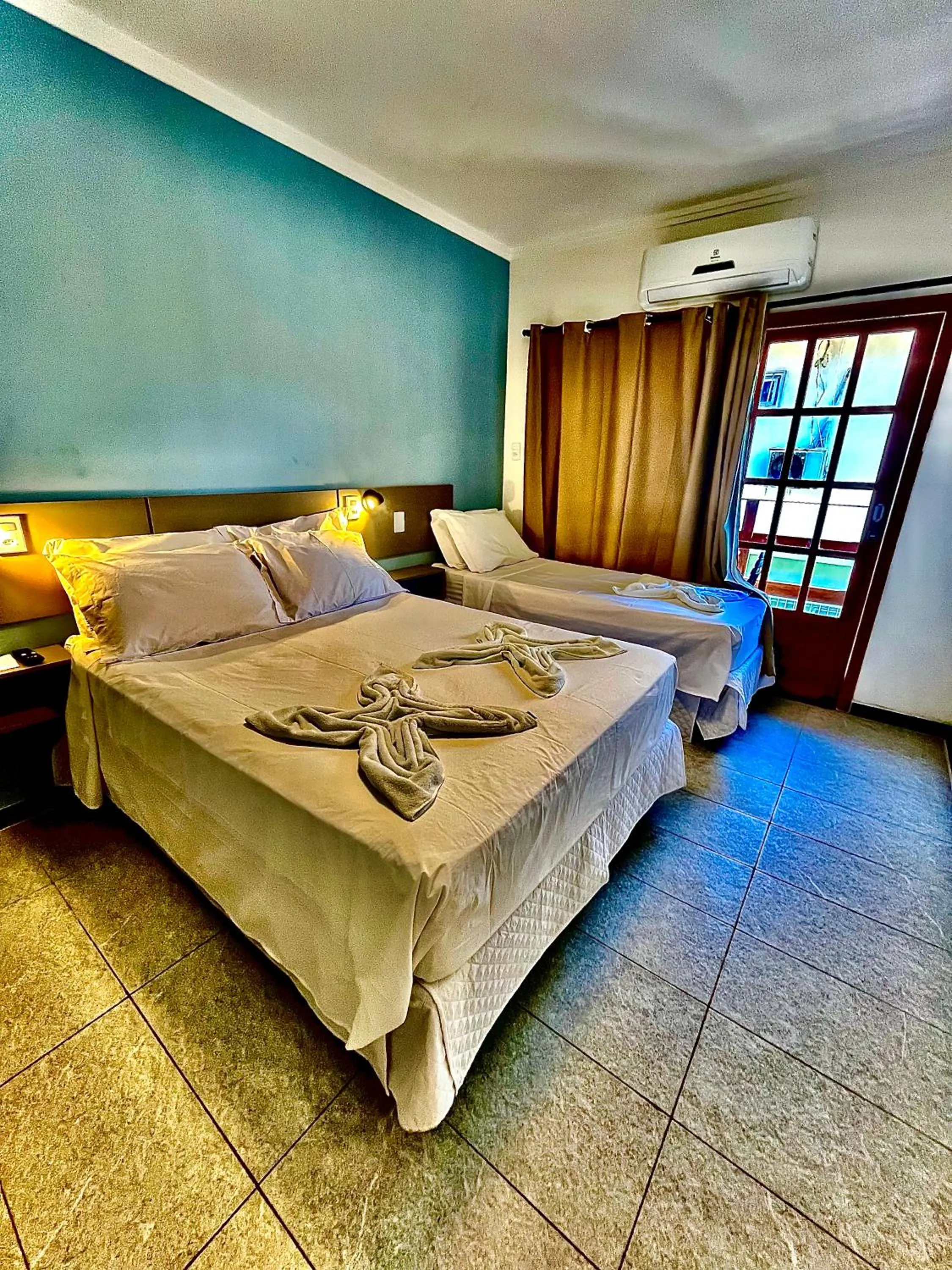 Bed in Pousada La Riviera - Pé na areia e Passeios em Maragogi