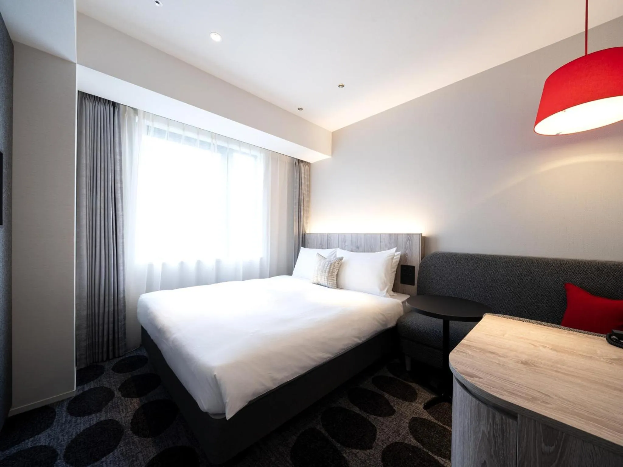 Bed in Hotel JAL City Toyama