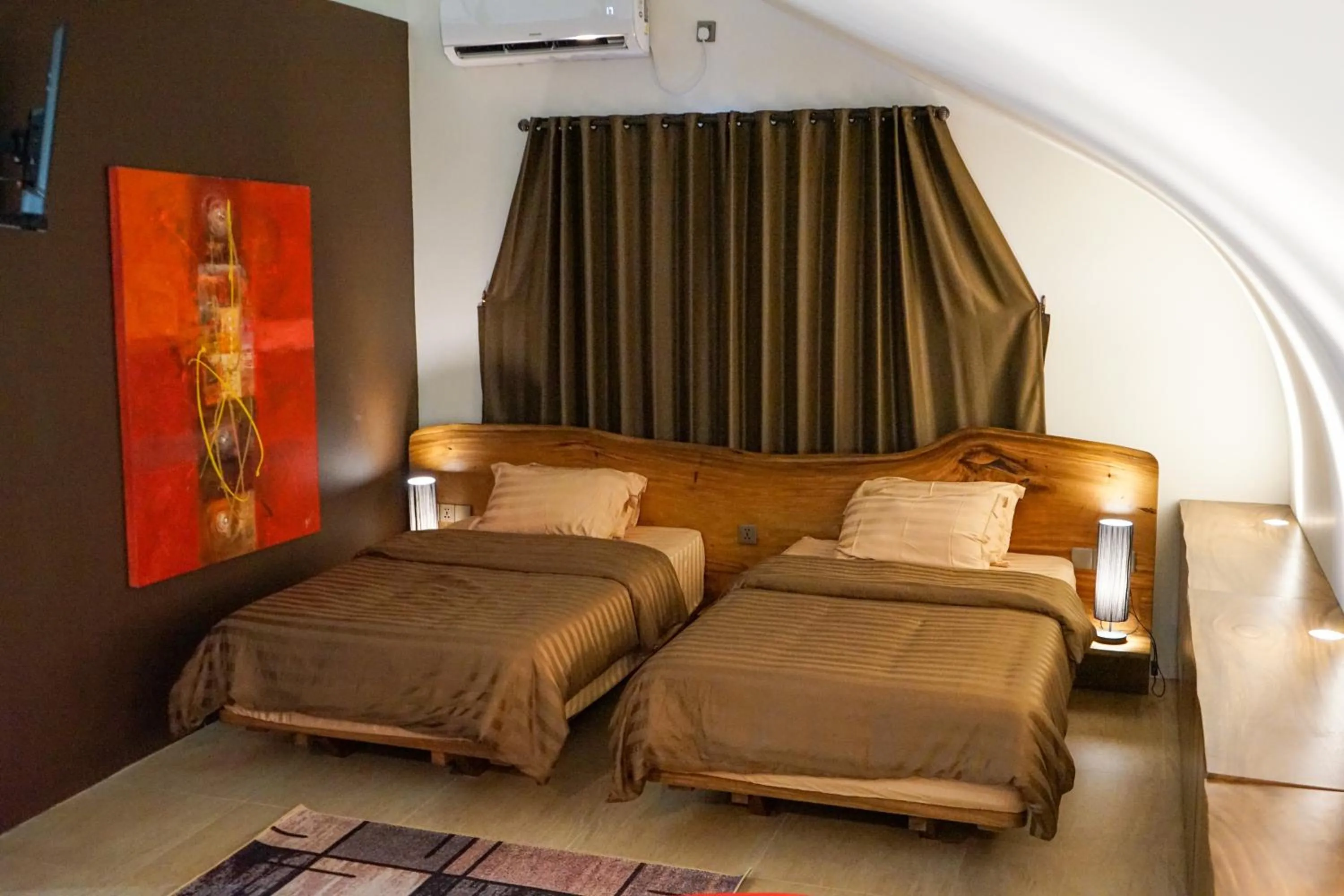 Bed in Lucca Resort & Residence
