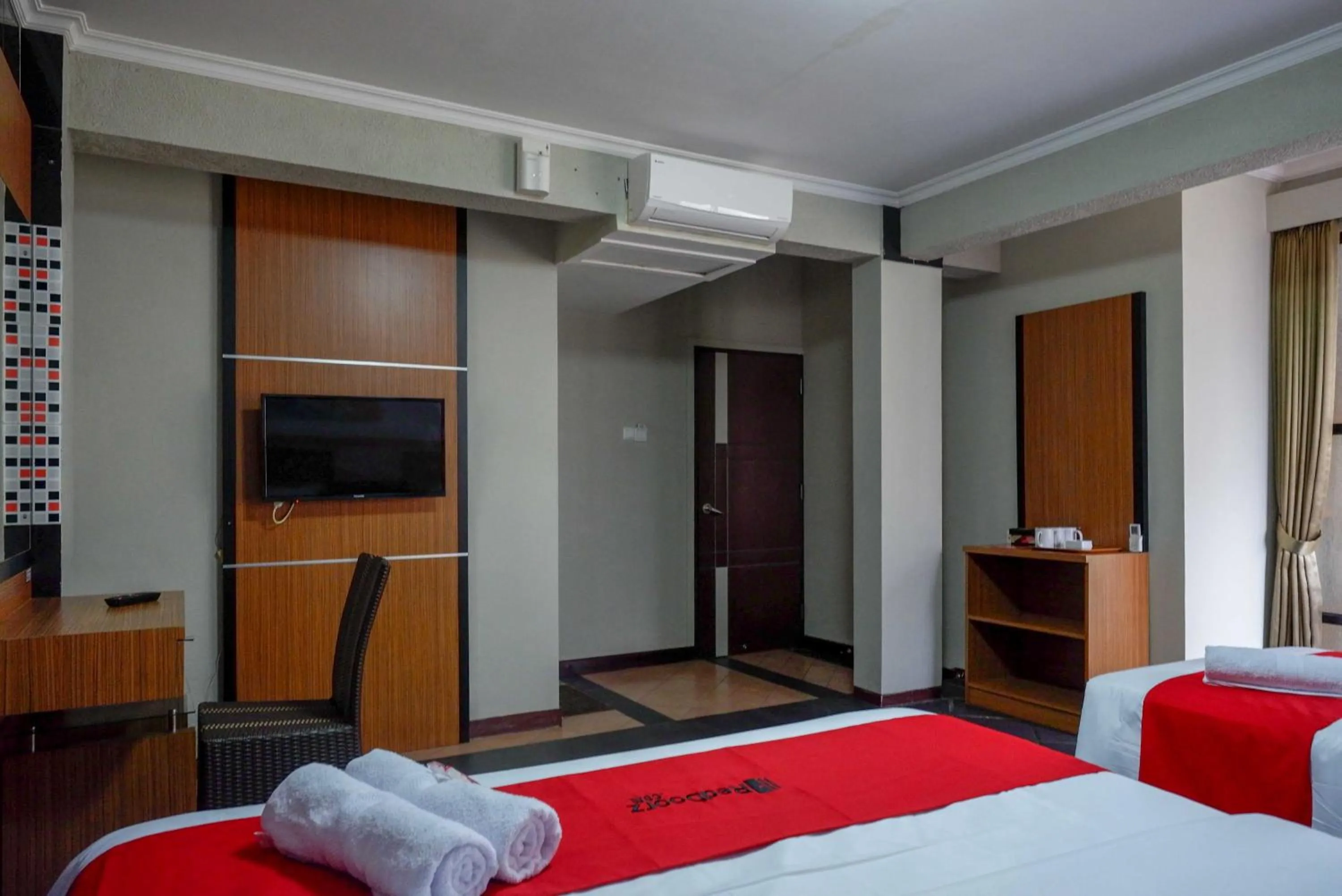 Bed in RedDoorz Plus near Amplaz Yogyakarta
