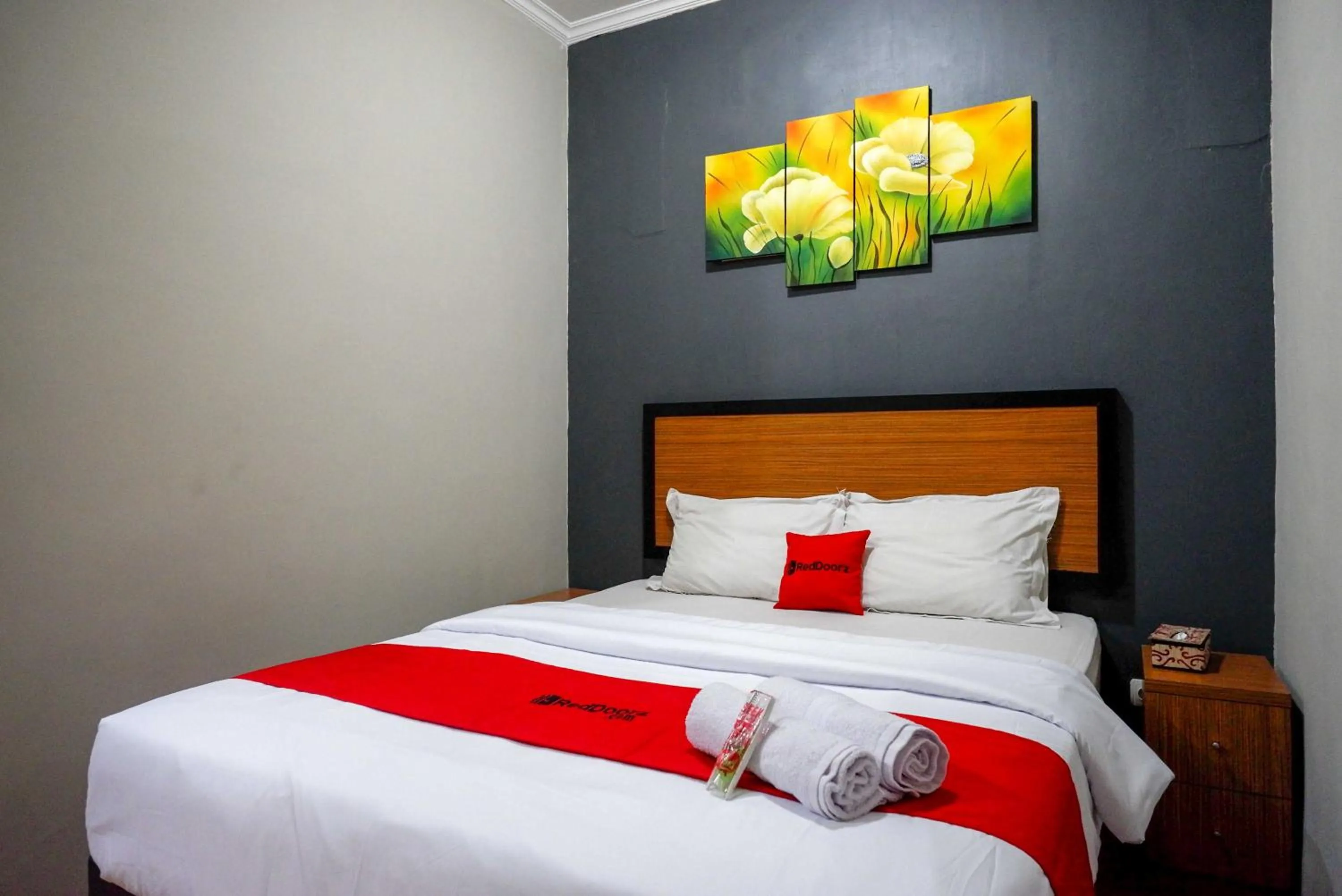 Bed in RedDoorz Plus near Amplaz Yogyakarta