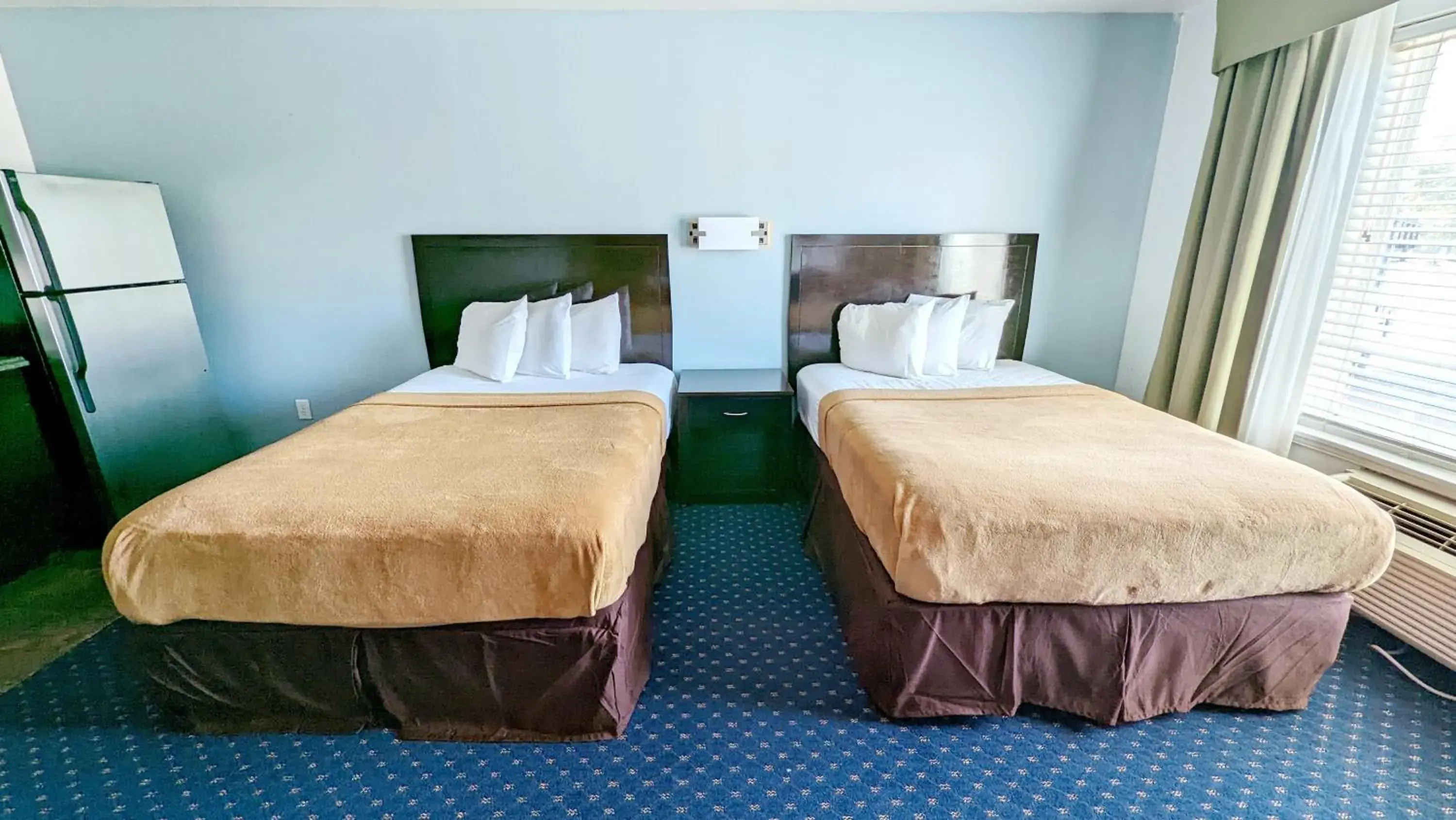 Bed in FairBridge Inn & Suites Canadian Bed in FairBridge Inn & Suites Canadian