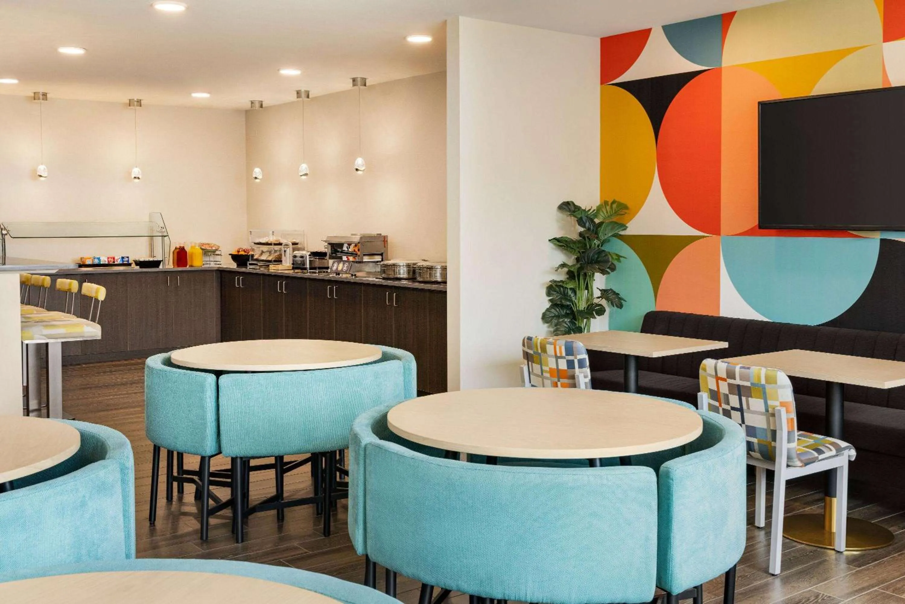 Restaurant/places to eat in The Orbit Hotel, Trademark Collection by Wyndham