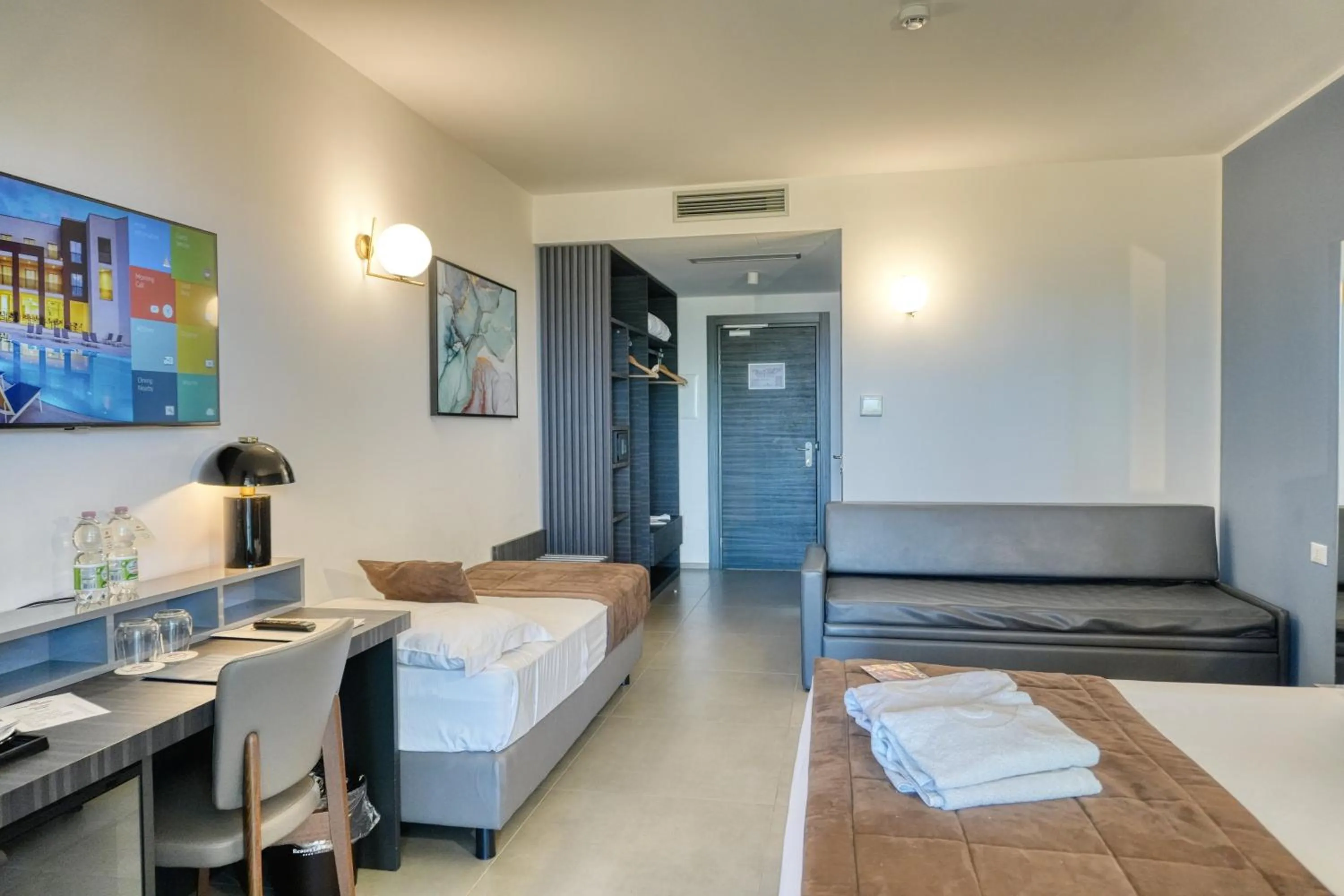 Bed in Resort La Battigia Beach & Spa