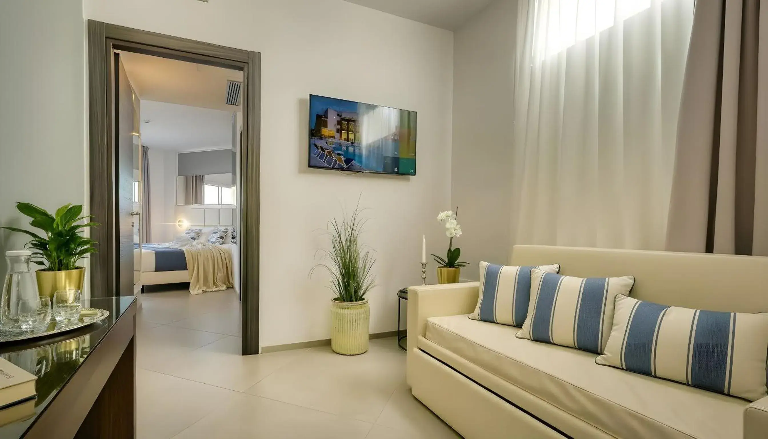 Family Suite with Terrace and Sea View in Resort La Battigia Beach & Spa Family Suite with Terrace and Sea View in Resort La Battigia Beach & Spa