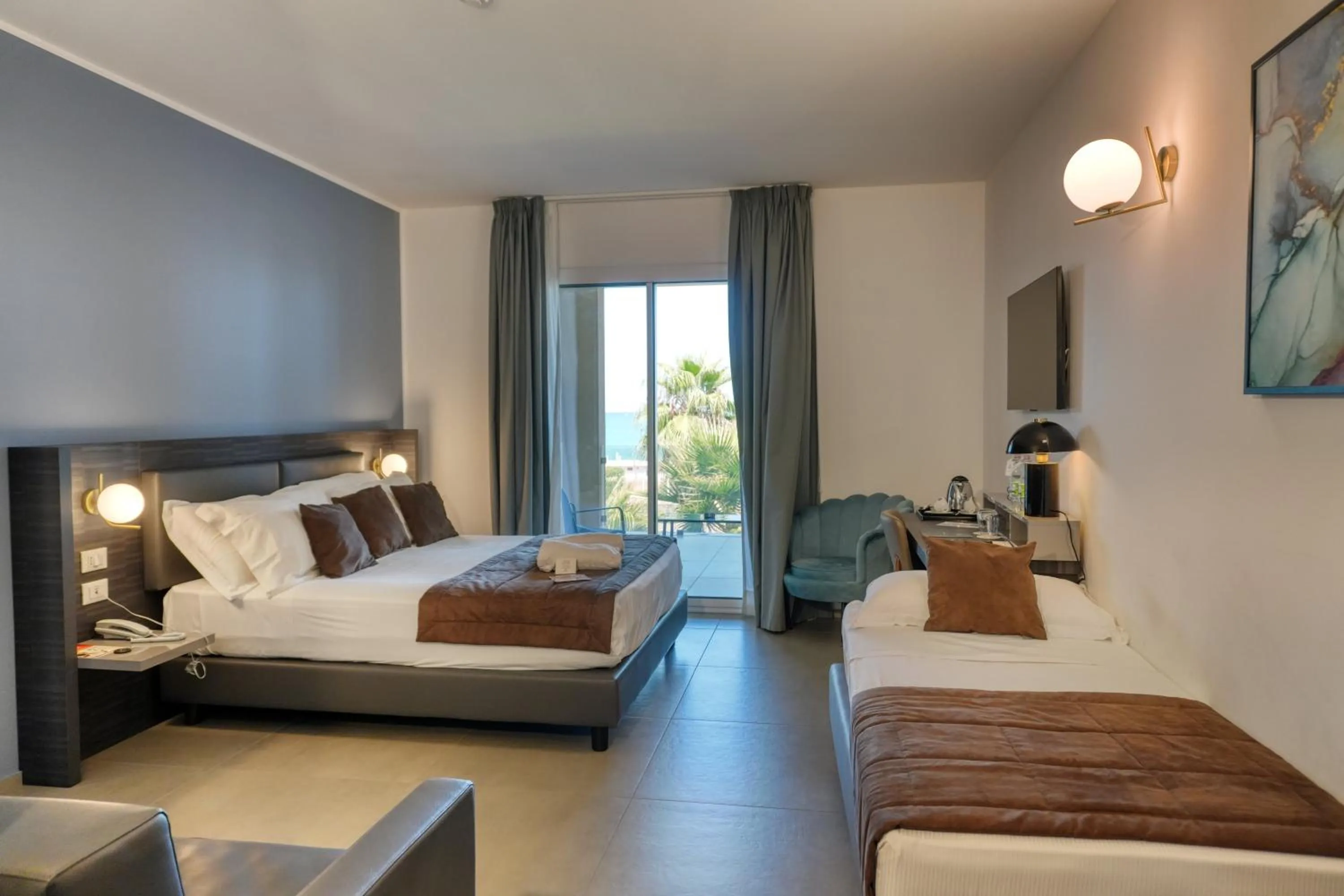 Bed in Resort La Battigia Beach & Spa