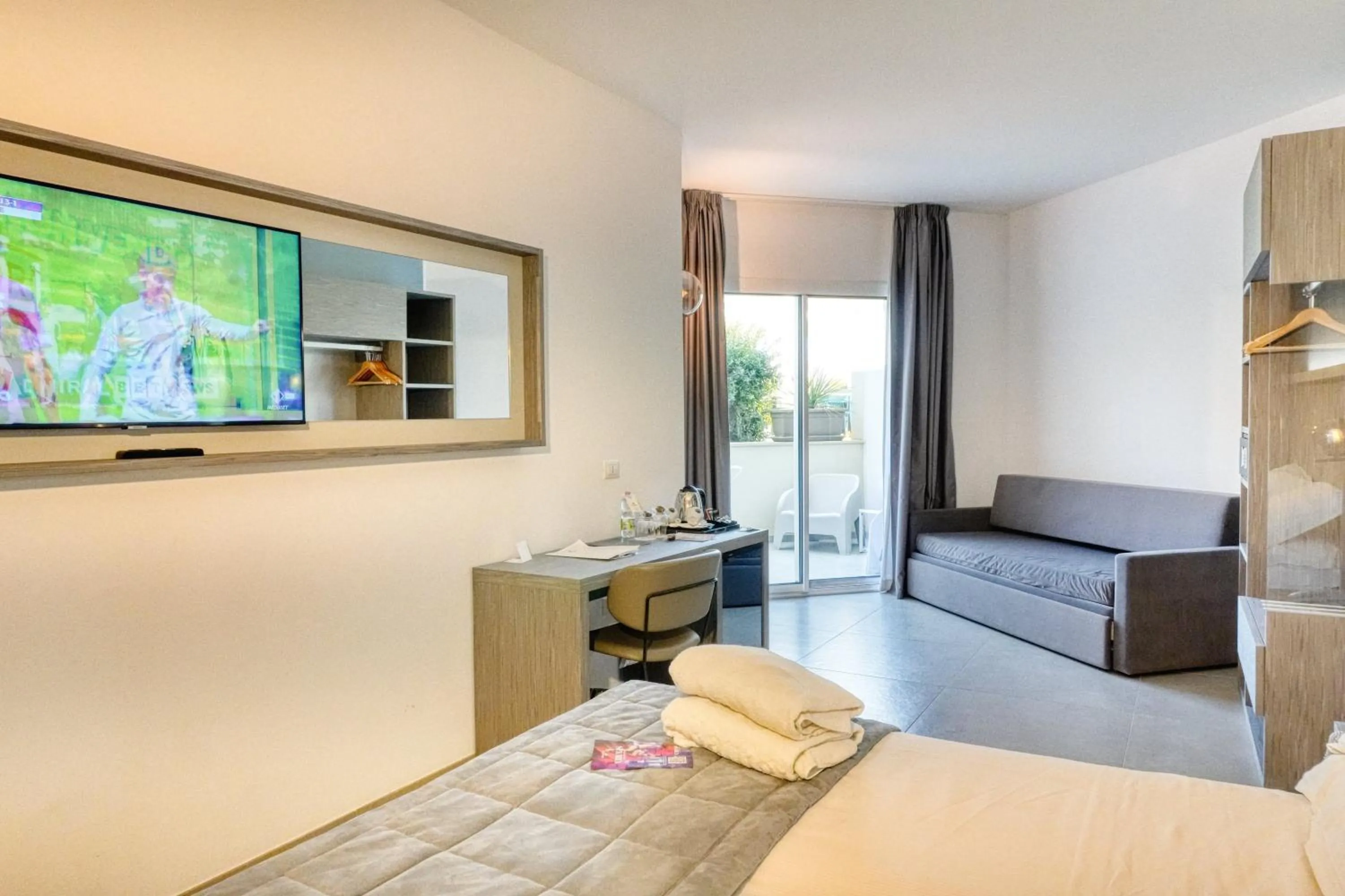 Bed in Resort La Battigia Beach & Spa