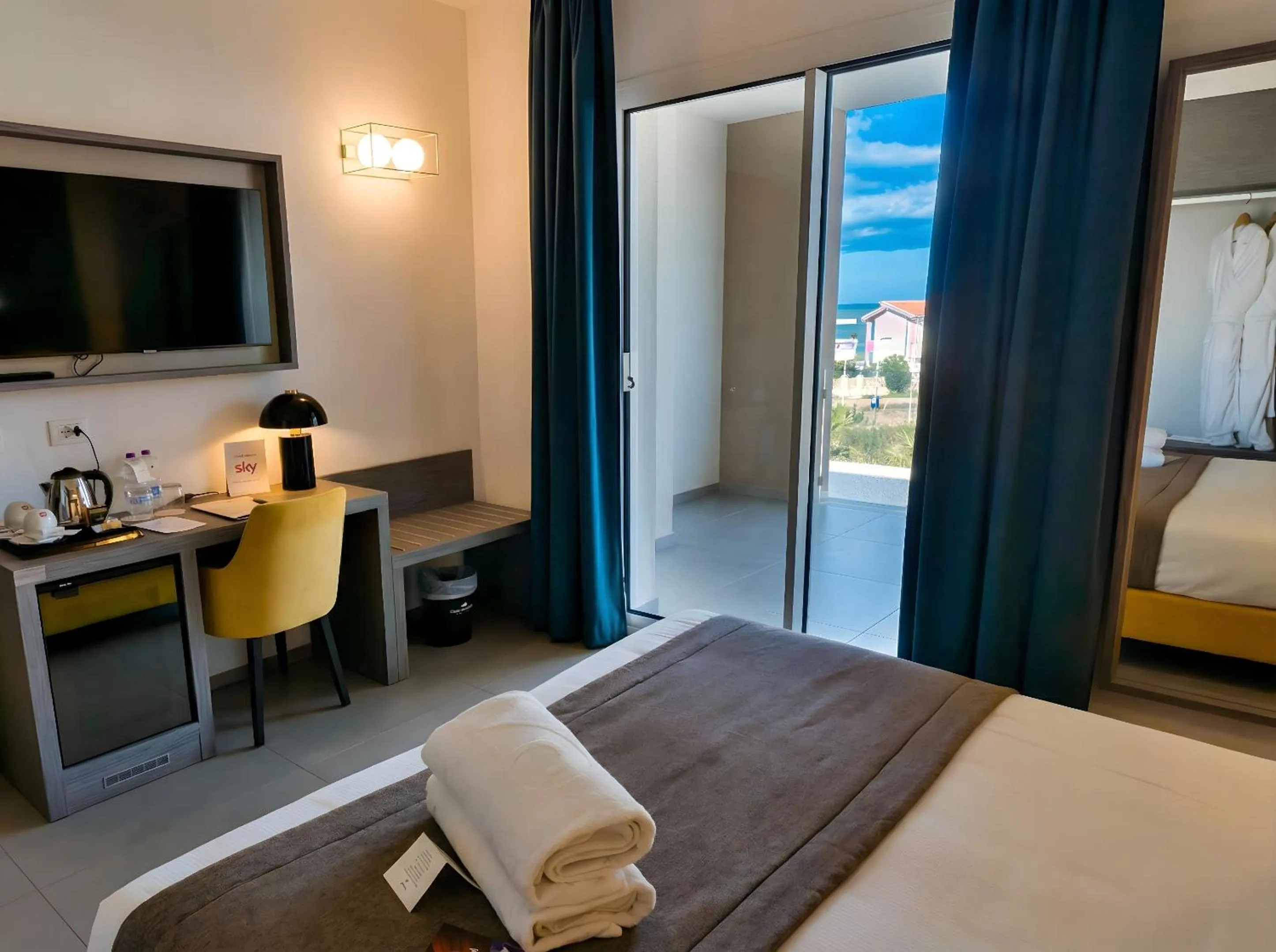 Bed in Resort La Battigia Beach & Spa