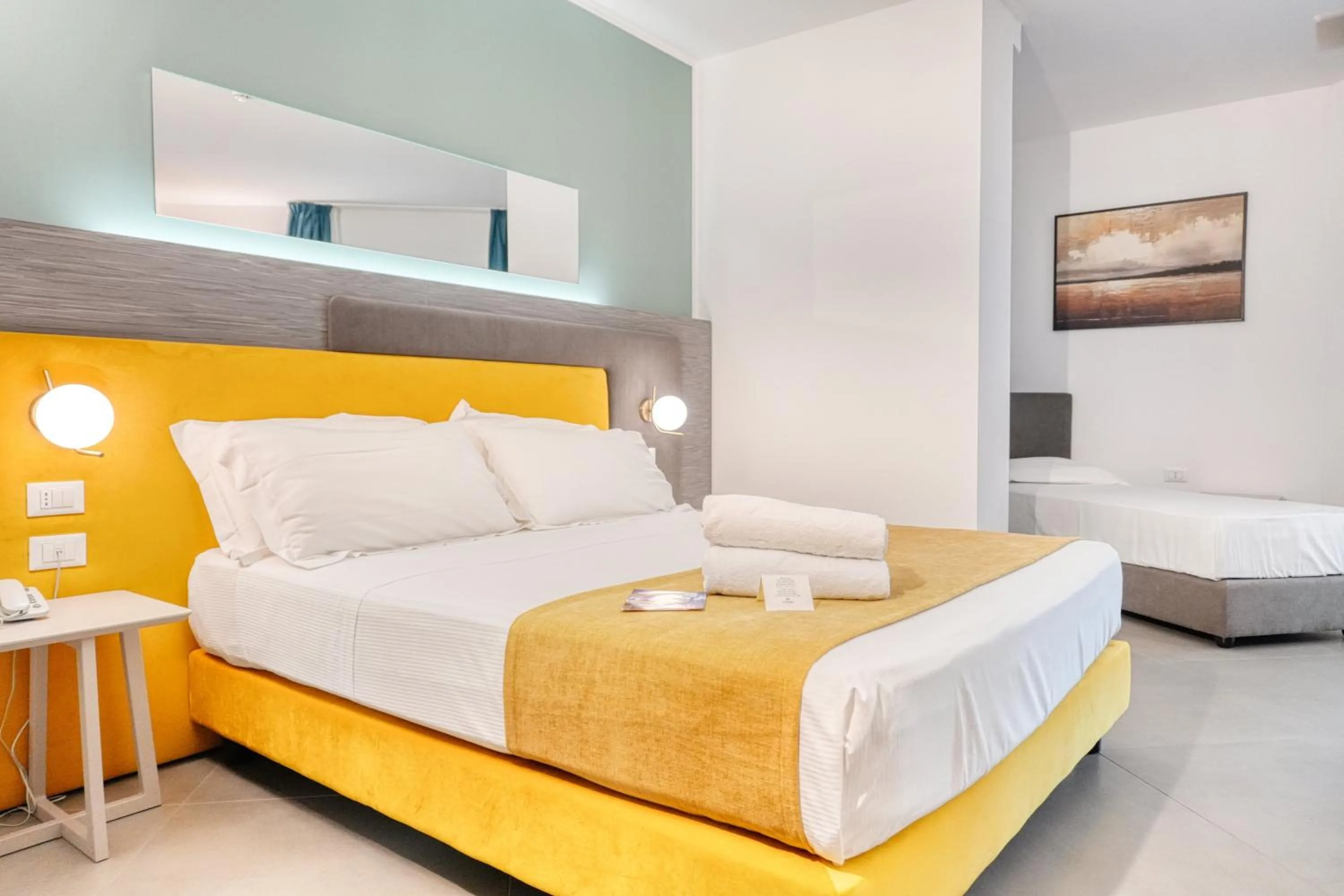 Bed in Resort La Battigia Beach & Spa