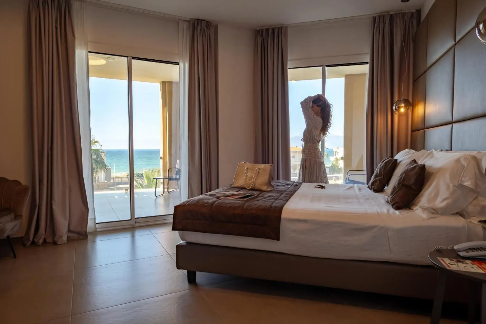 Junior Suite with Terrace and Sea View in Resort La Battigia Beach & Spa Junior Suite with Terrace and Sea View in Resort La Battigia Beach & Spa