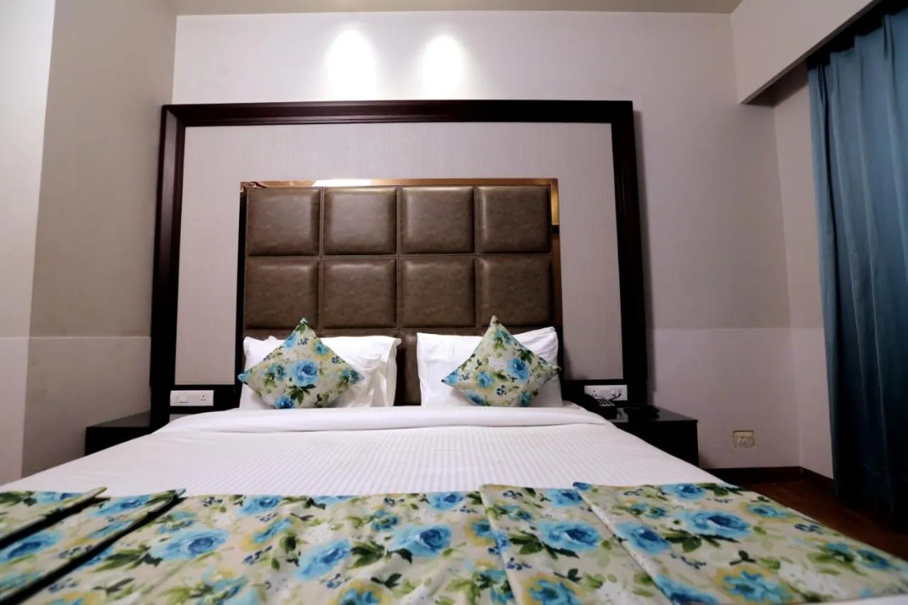 Bed in The Stella Hotel & Resort