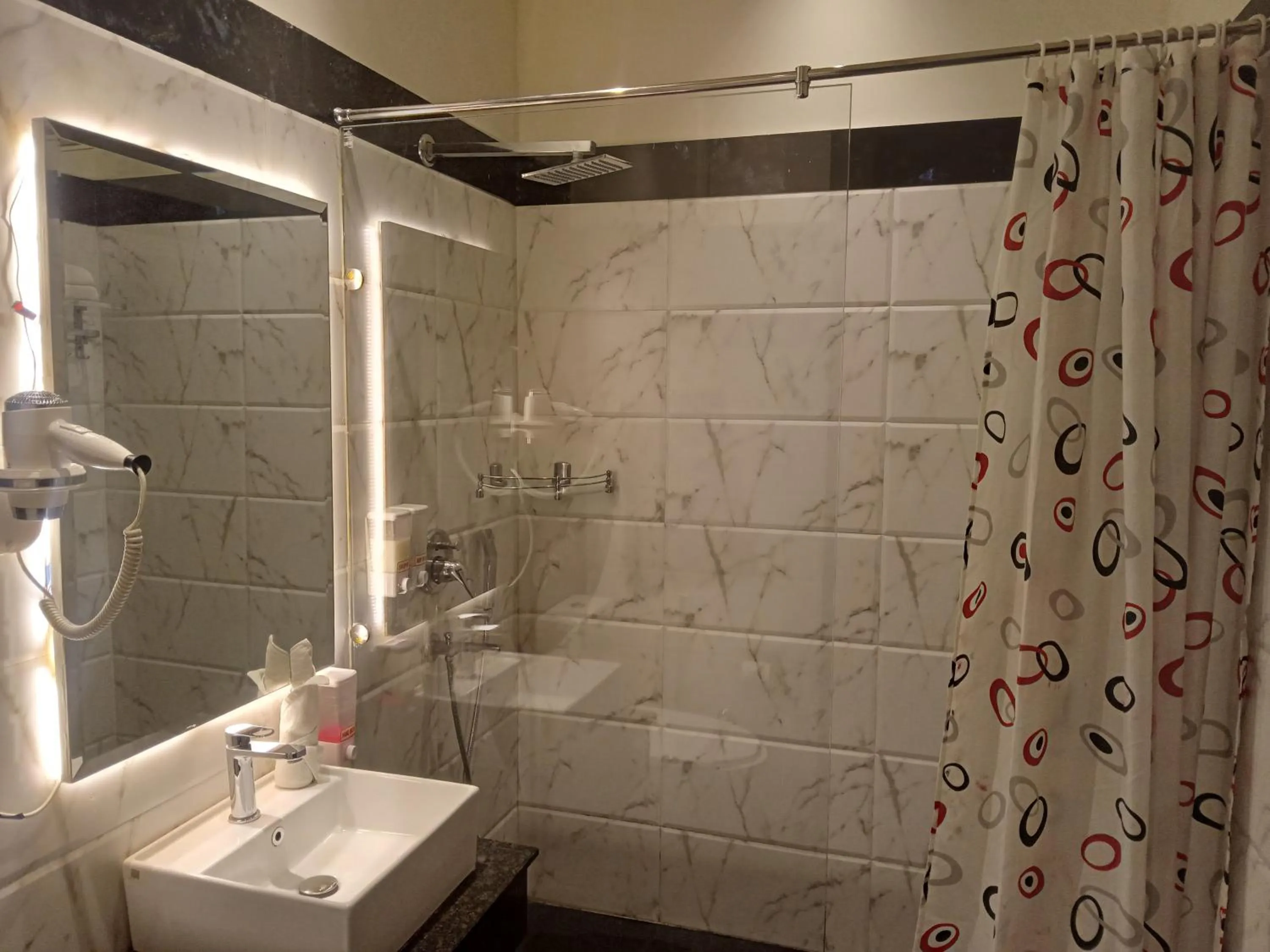 Shower in The Stella Hotel & Resort