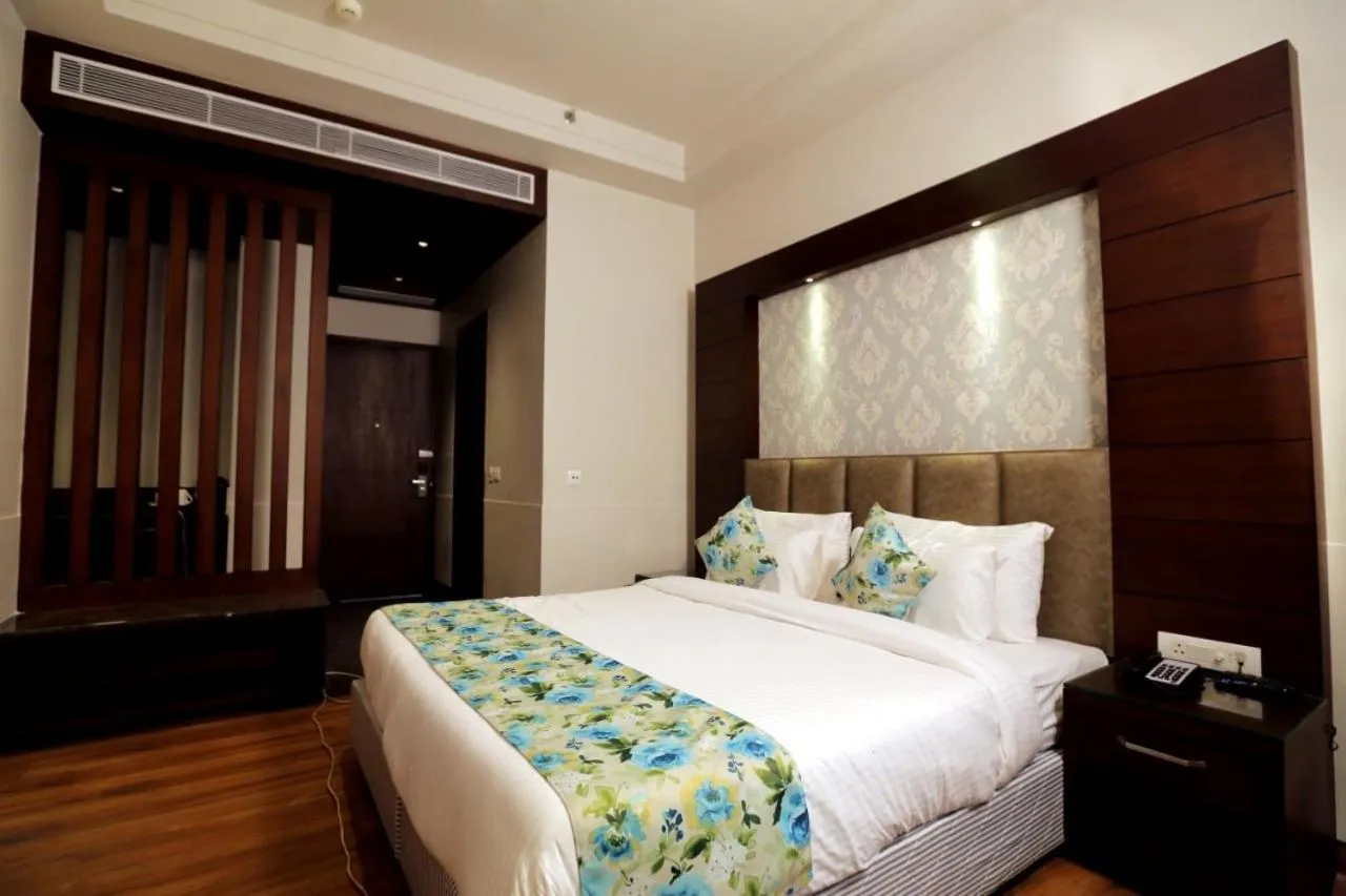 Bed in The Stella Hotel & Resort