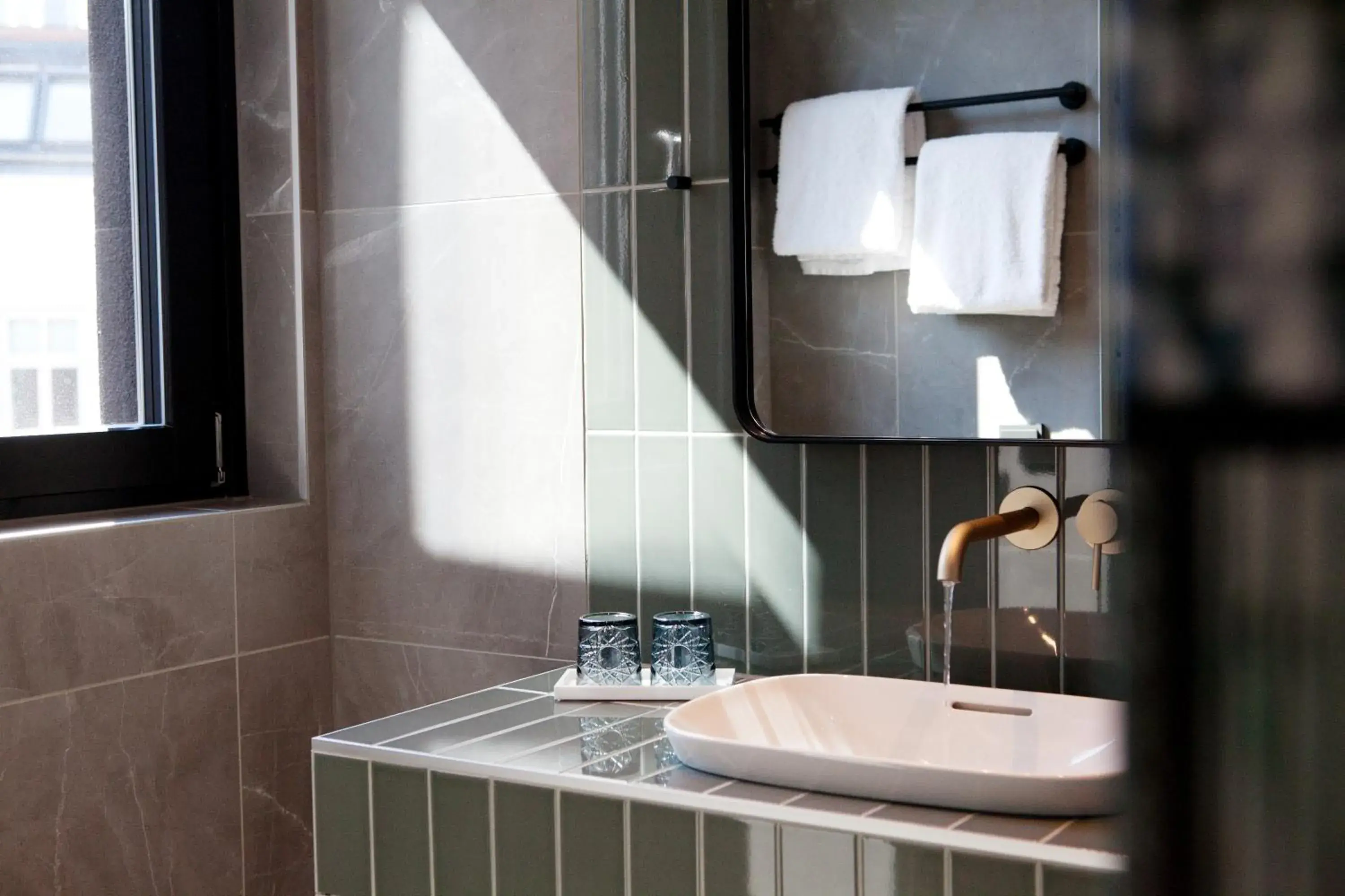 Bathroom in Hotel Indigo Vienna - Naschmarkt by IHG Bathroom in Hotel Indigo Vienna - Naschmarkt by IHG