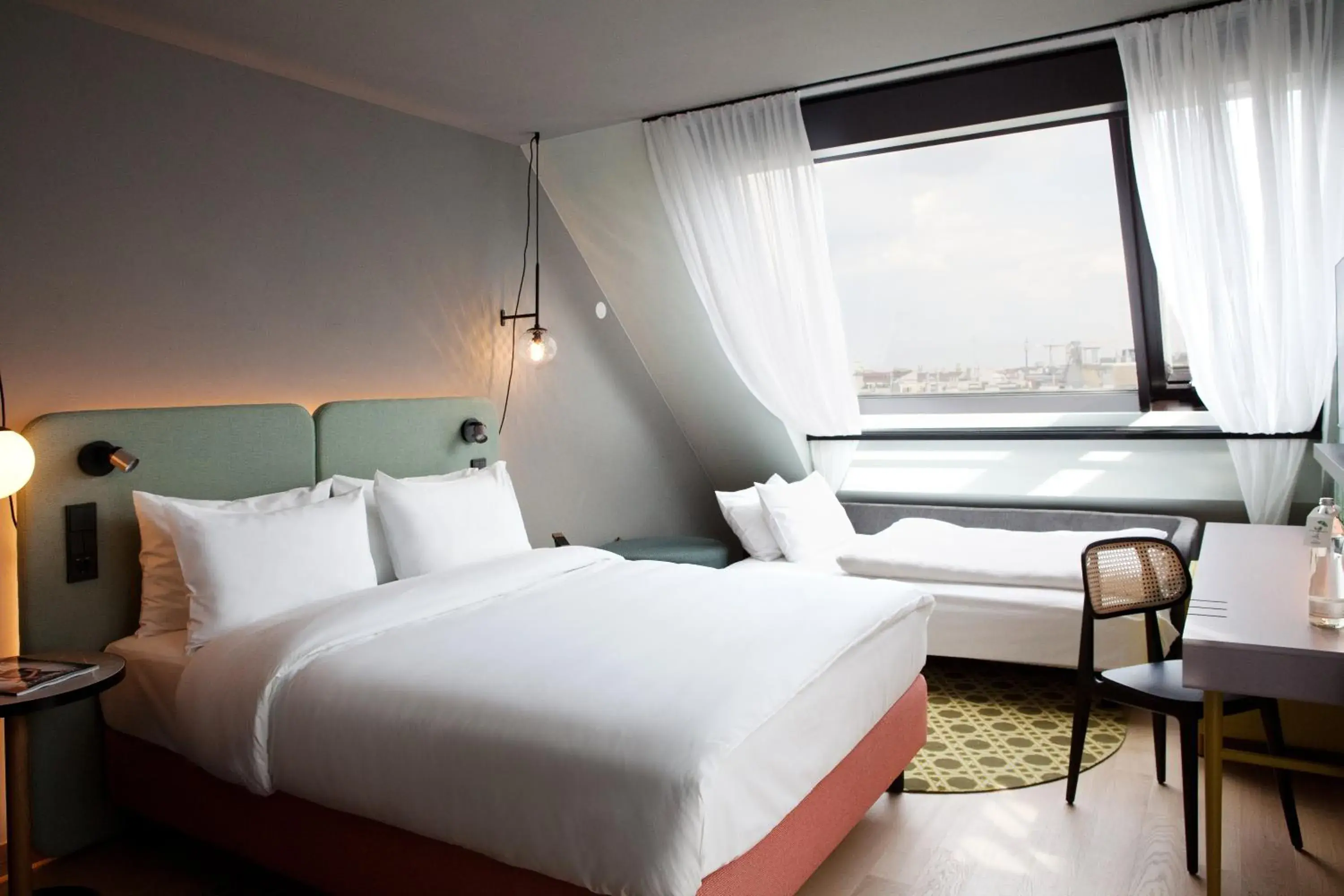 Bed in Hotel Indigo Vienna - Naschmarkt by IHG Bed in Hotel Indigo Vienna - Naschmarkt by IHG