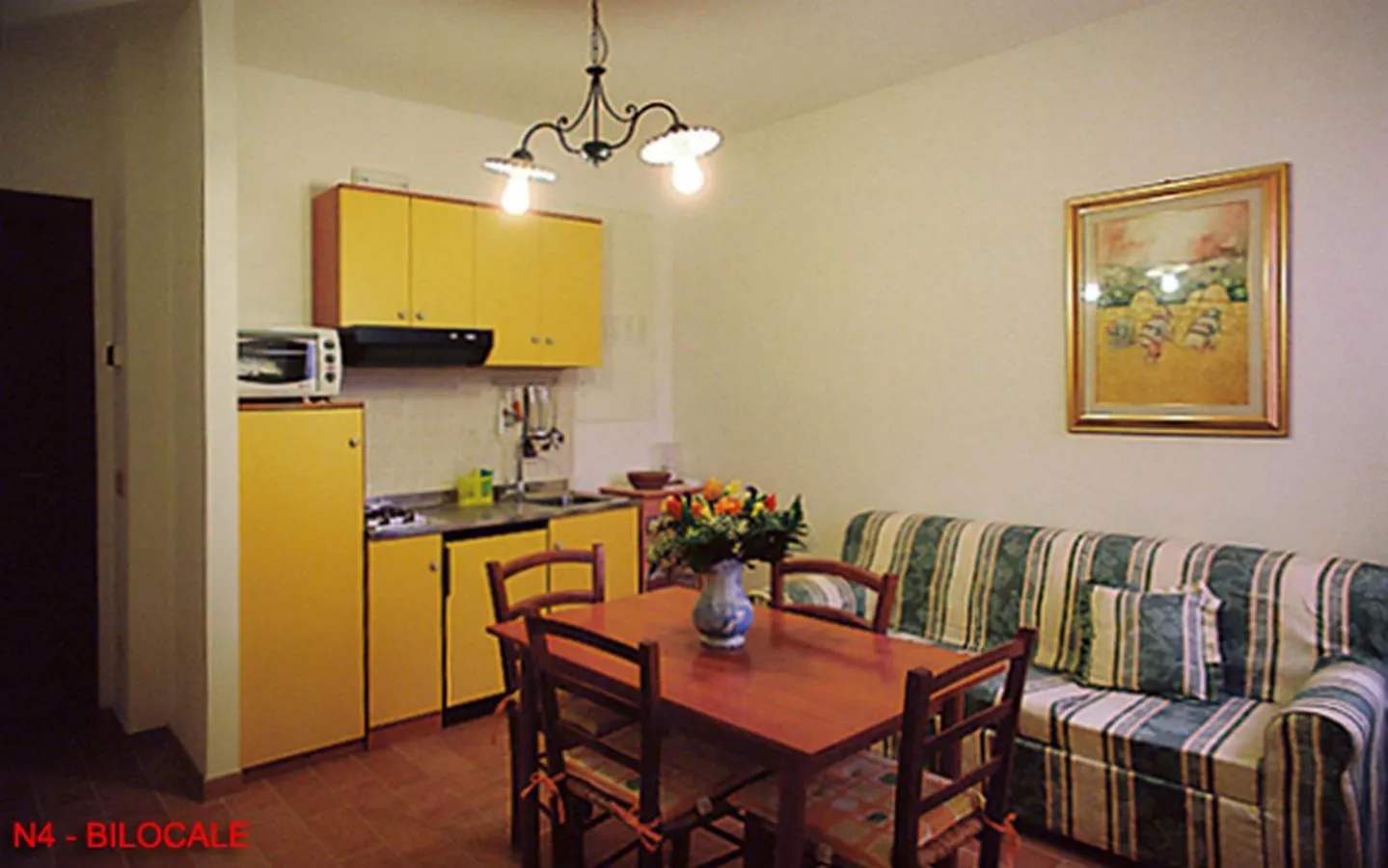 Kitchen or kitchenette in La casa di Carla