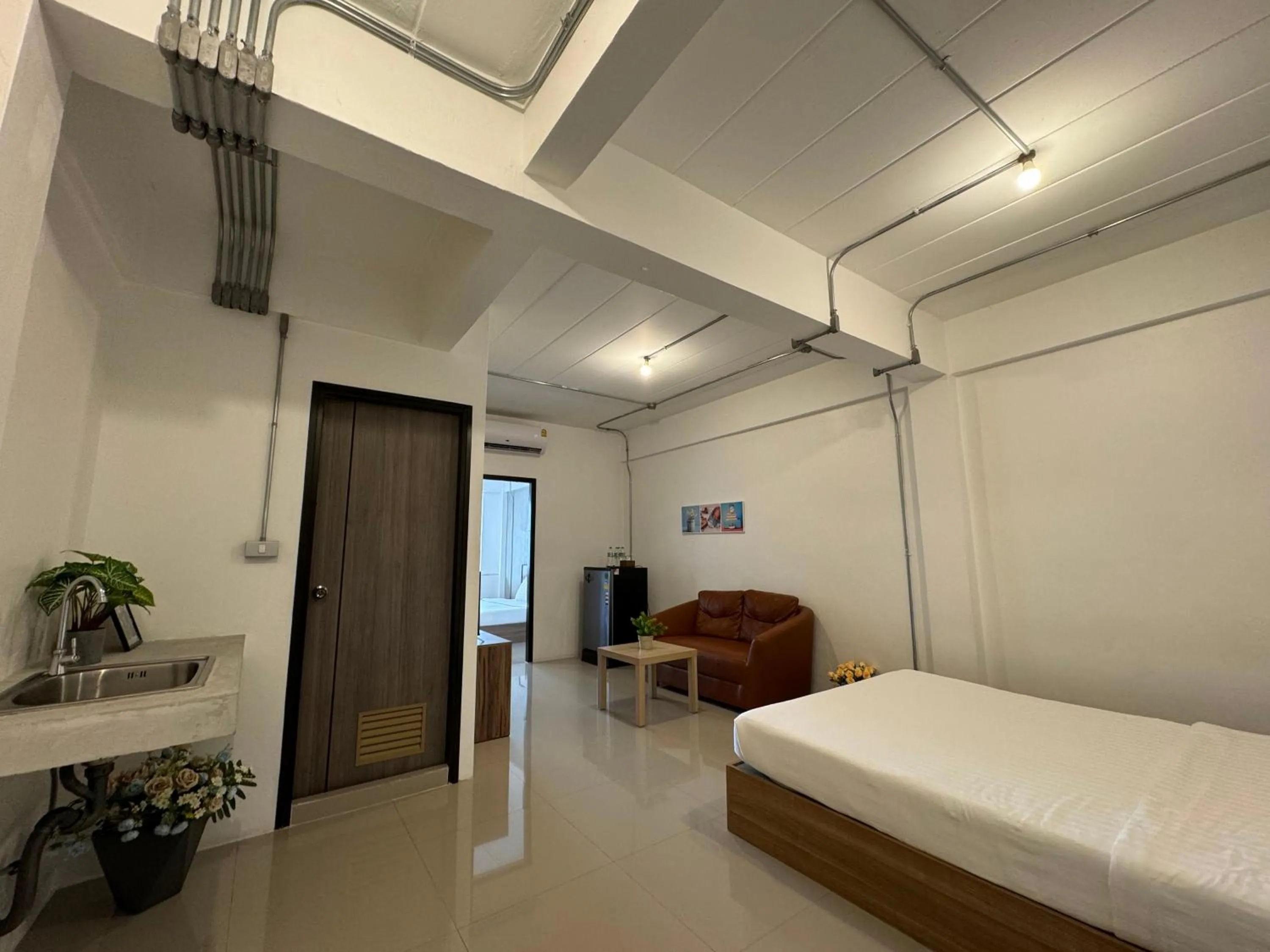 Seating area, Bed in Luka House