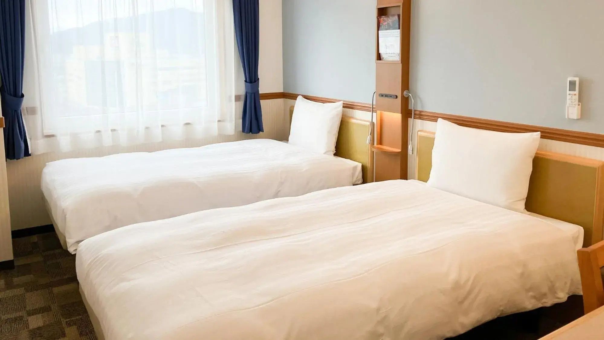 Bedroom, Bed in Toyoko Inn Tsuruga Ekimae Bedroom, Bed in Toyoko Inn Tsuruga Ekimae