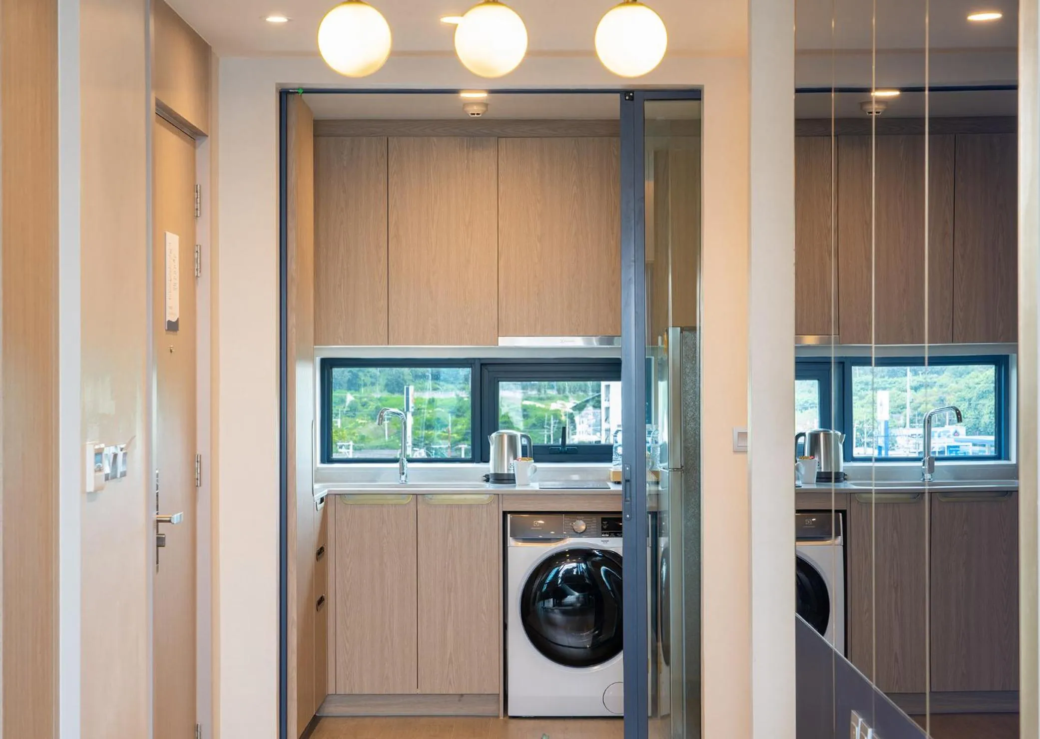 Kitchen or kitchenette in S Sriracha Hotel & Residence