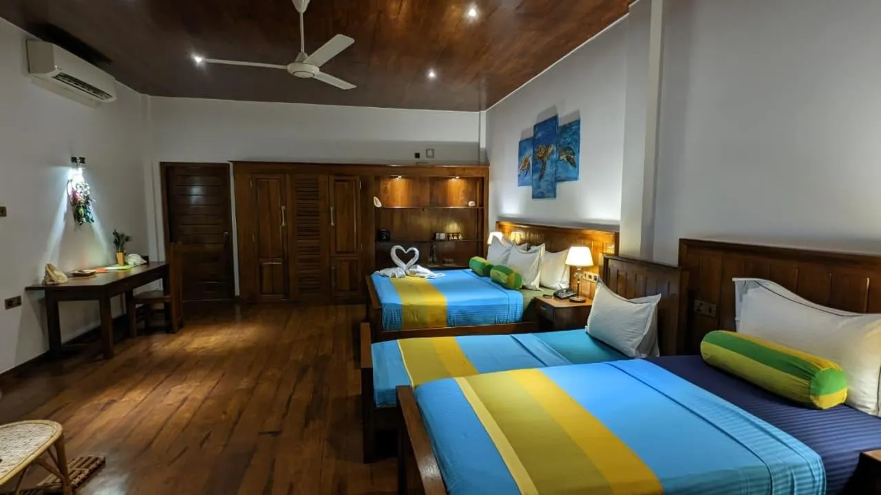 Bed in Lagoon gate Tangalle Resort